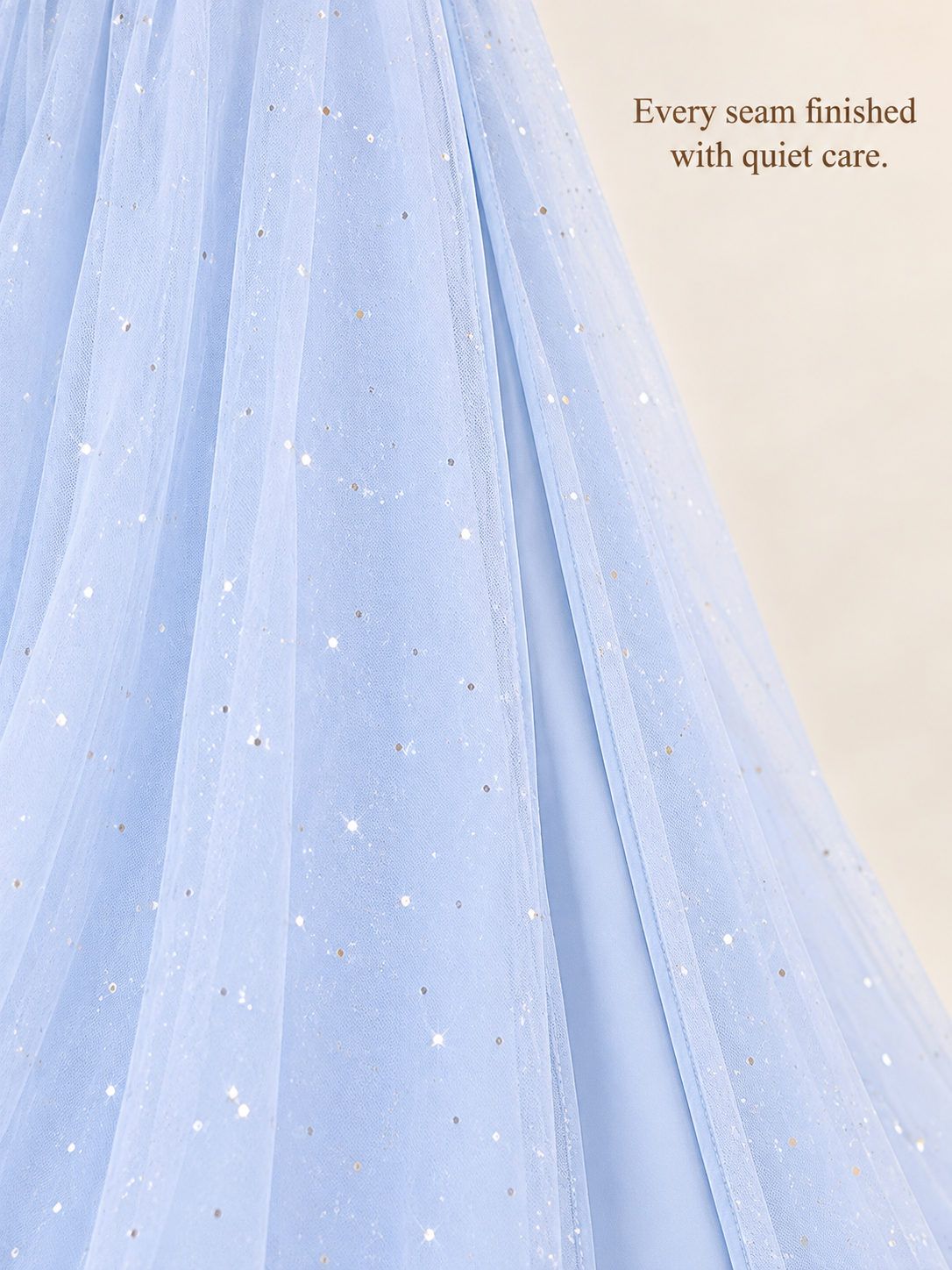 Odette Light Blue maternity dress — close-up of the sparkle-flecked tulle skirt
