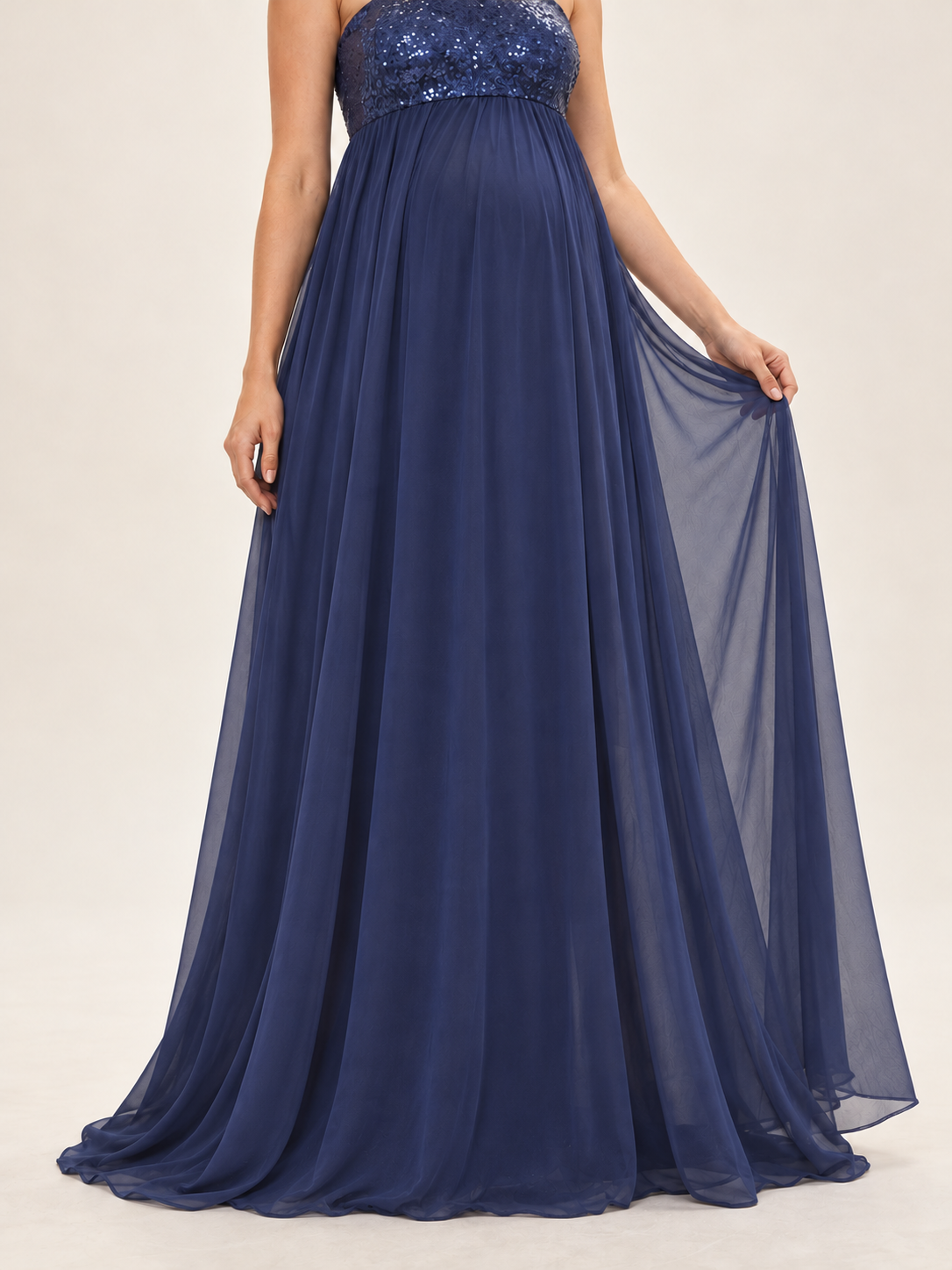 Josephine Navy maternity dress — chiffon skirt held out to show the lining and hem