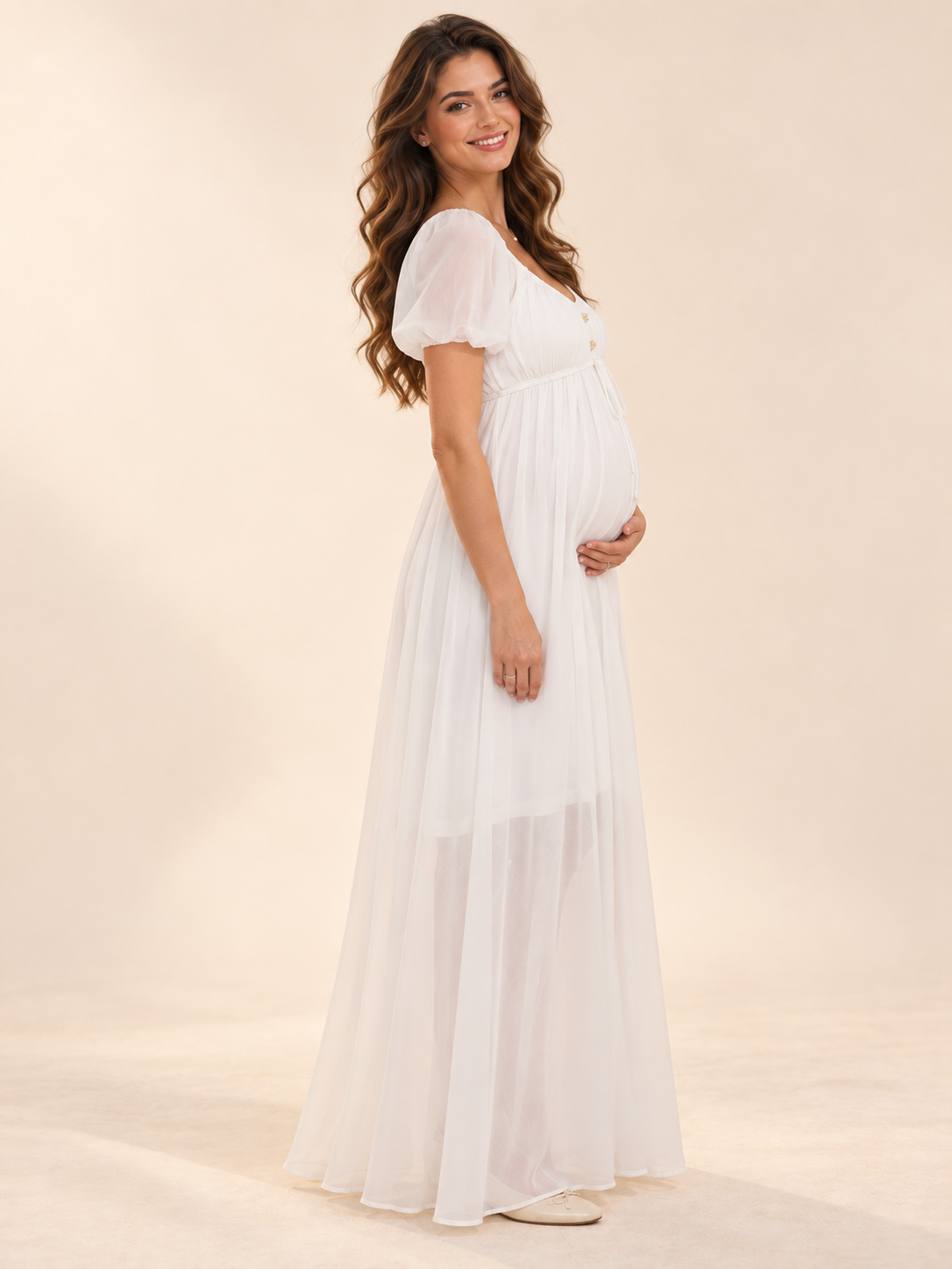 Greta White maternity dress — side view of the empire waist and bump silhouette
