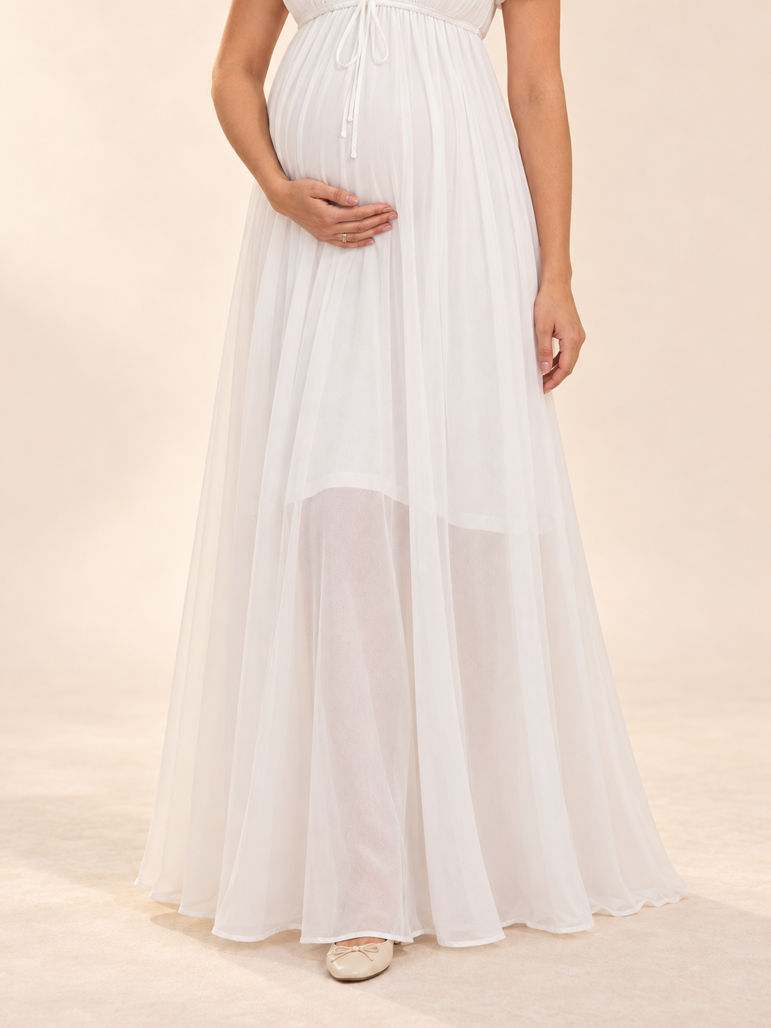 Greta White maternity dress — sheer overlay skirt with the shorter lining showing