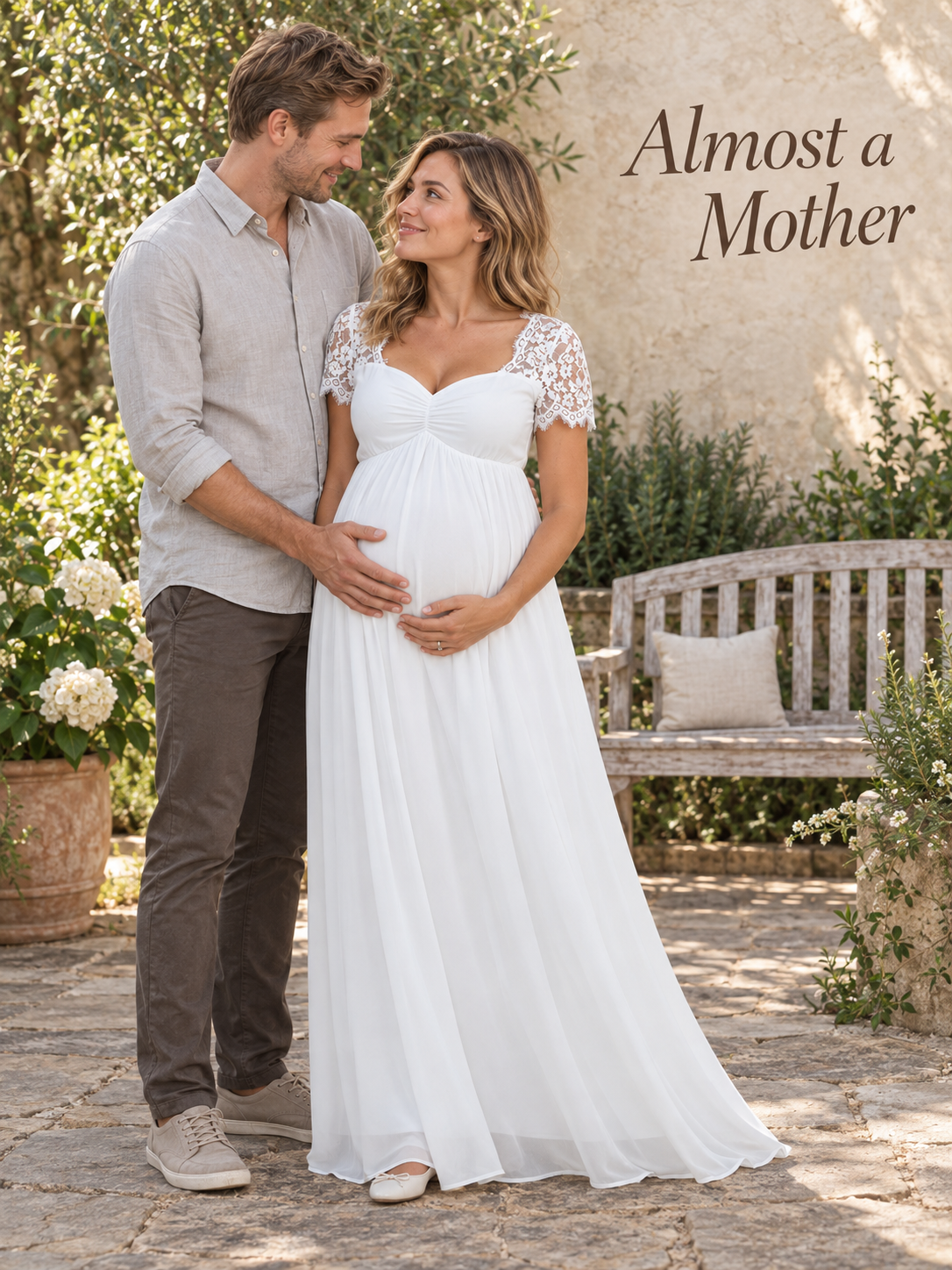 Madeleine White maternity dress — sharing a quiet garden moment with her partner