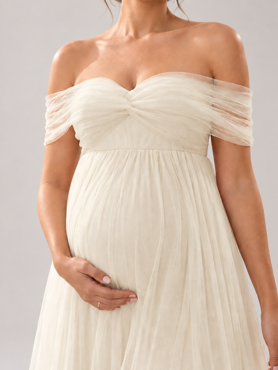 Close-up of overlapping tulle pleats at the Amelie dress neckline.