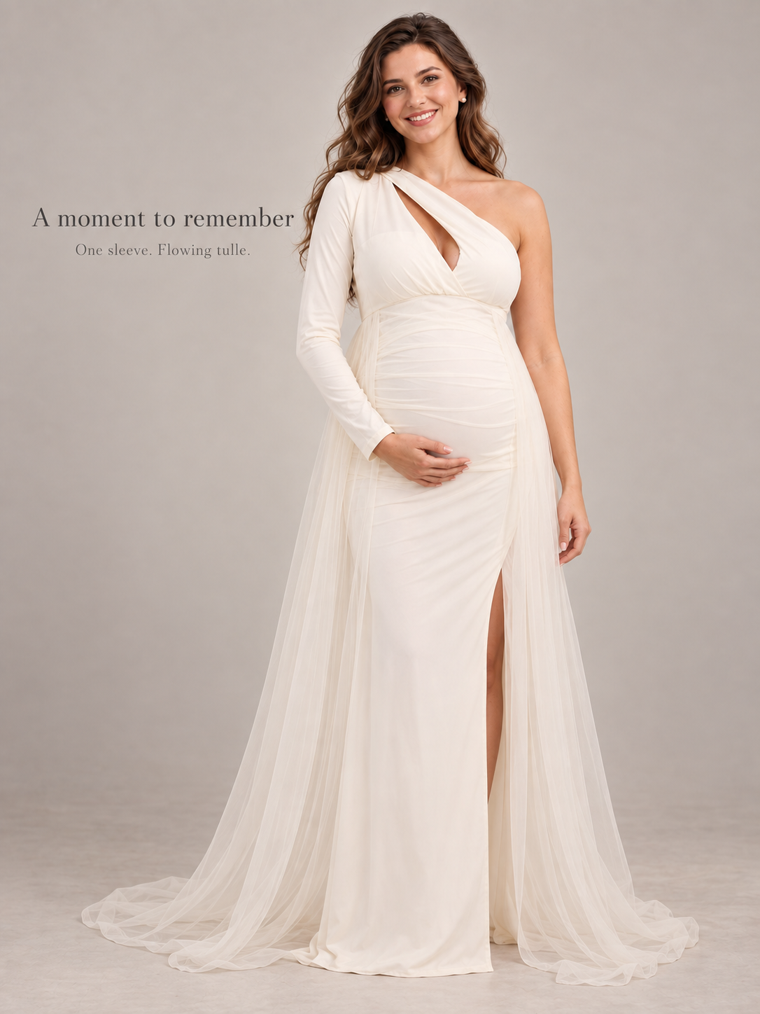 Aurelia Cream maternity dress — full-length studio view of the single sleeve and tulle overskirt