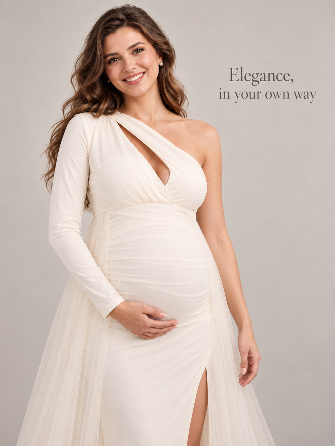 Aurelia Cream maternity dress — half-length view of the one-shoulder silhouette and slit