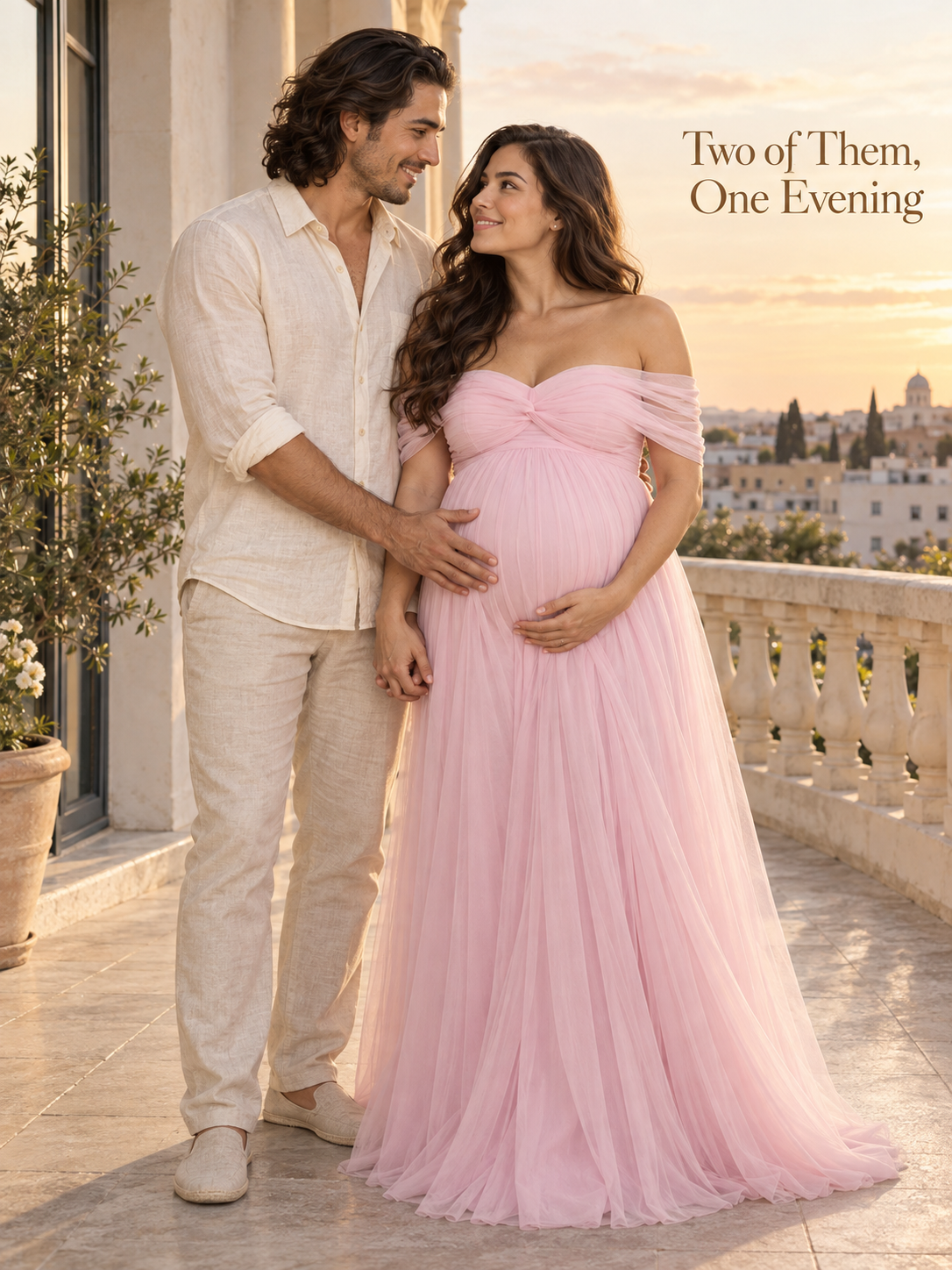 Orielle Light Pink maternity dress — an evening moment with her partner on a terrace