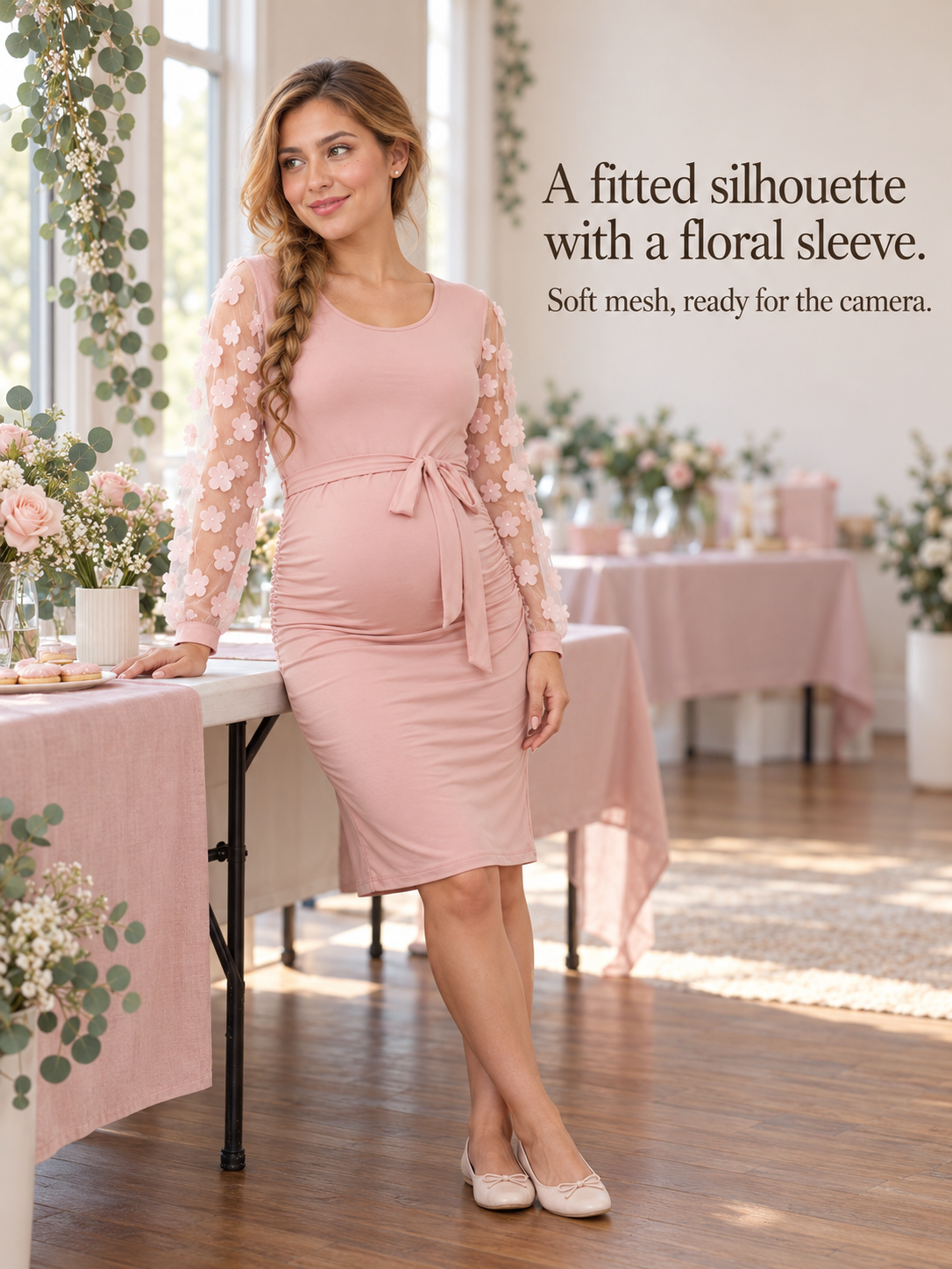 Beatrix Blush Pink maternity dress — standing indoors at a table set for a celebration
