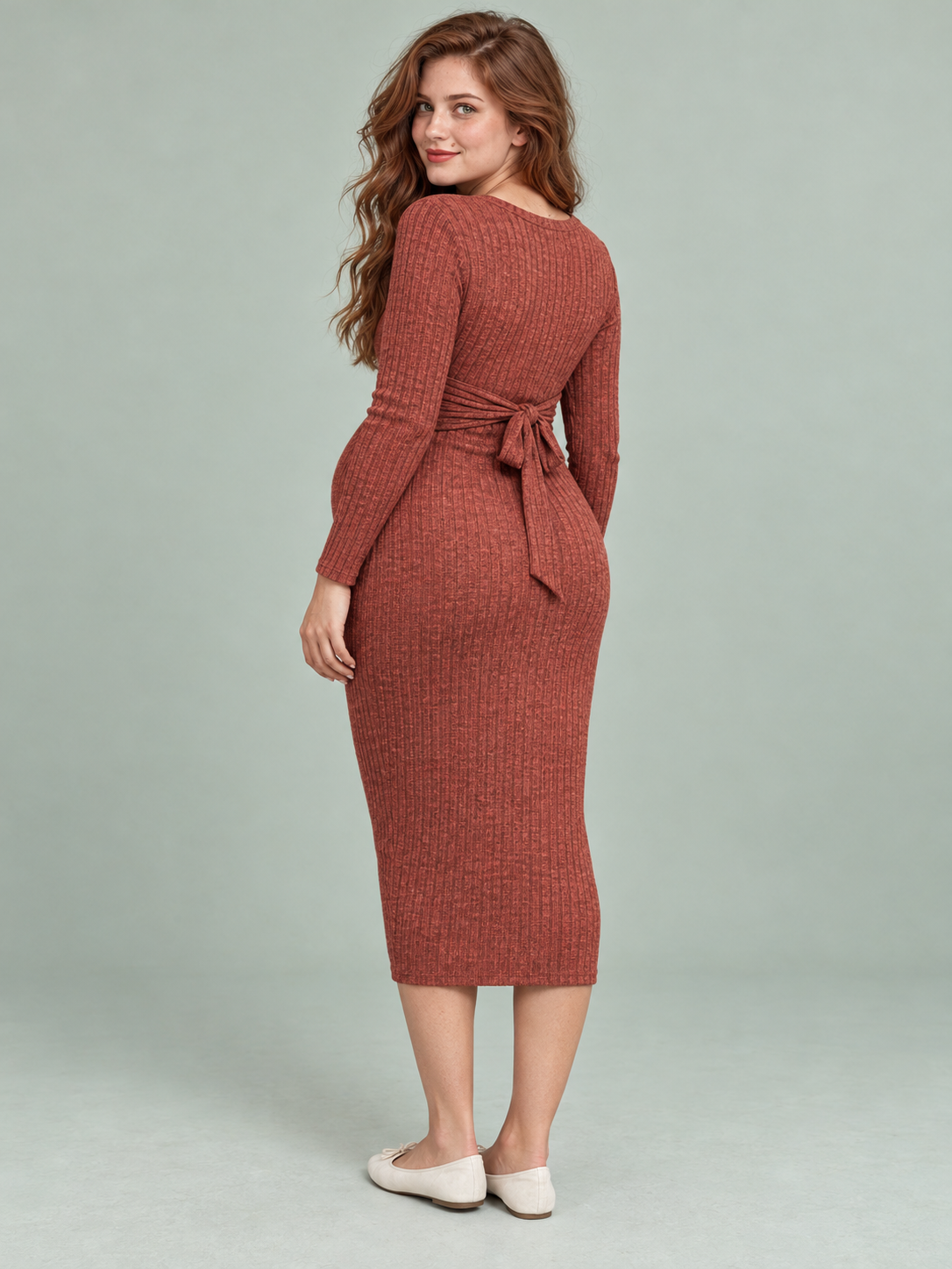 Maeve Rust Red maternity dress — back view of the twist-front tie knotted into a bow