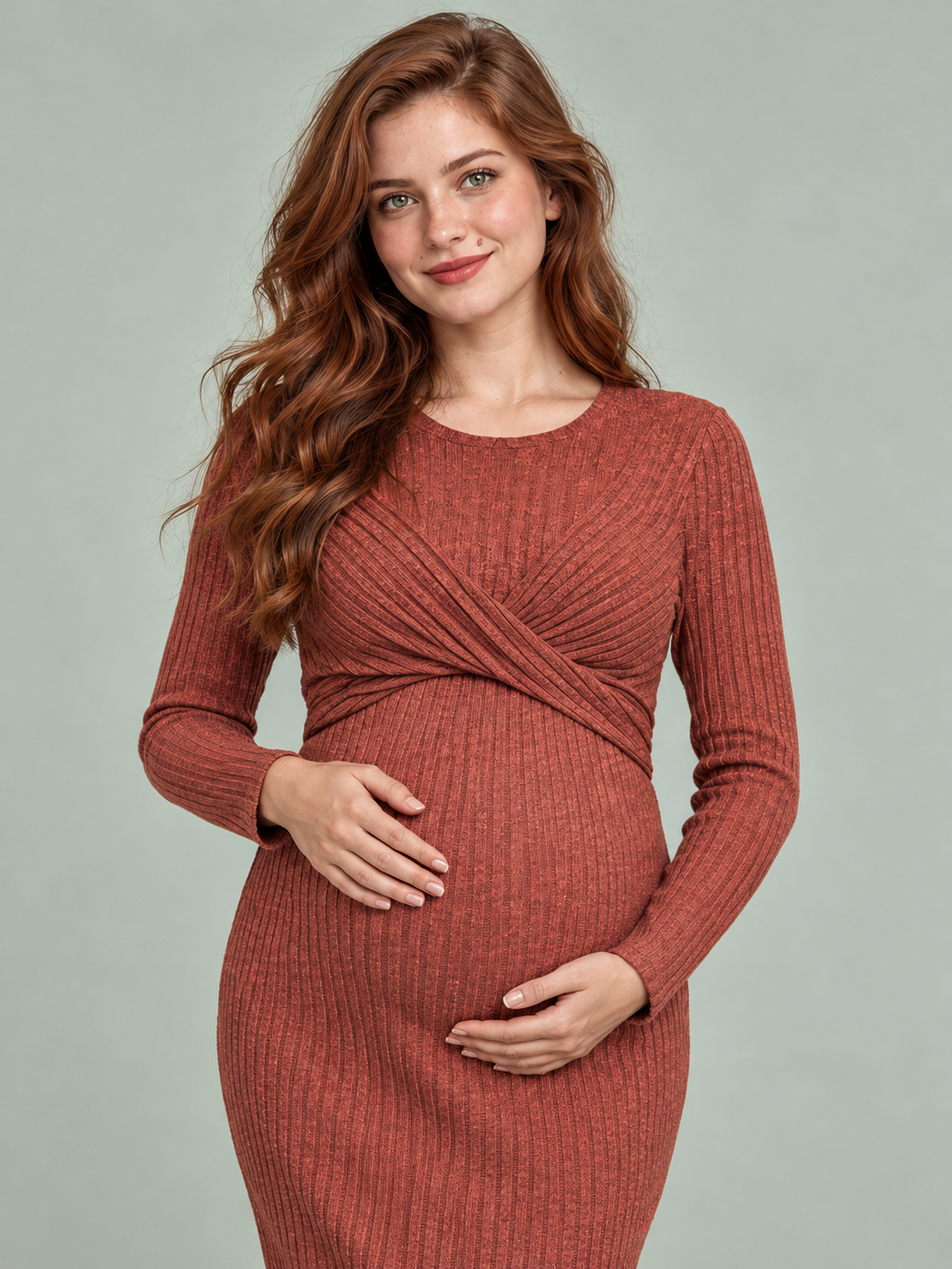 Maeve Rust Red maternity dress — close-up of the crew neckline and twist-front waist