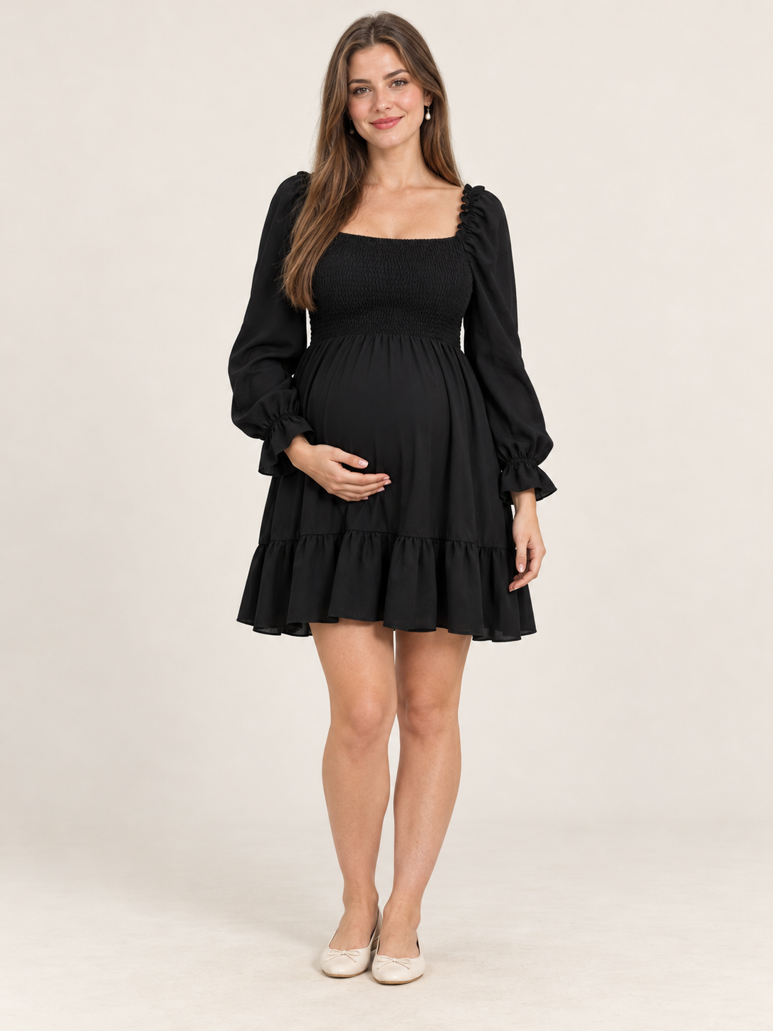 Penelope Black maternity dress — front view with square neckline, smocked bodice and ruffled mini skirt