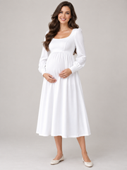 Aurelie White maternity dress — front view with softly squared neckline, cuffed long sleeves and midi skirt