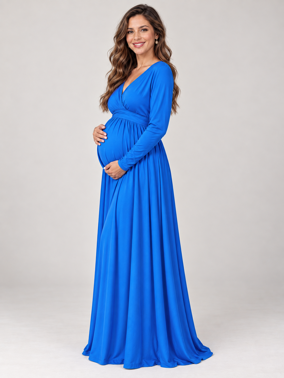 Nora Royal Blue maternity dress — side view of the empire waist and bump silhouette