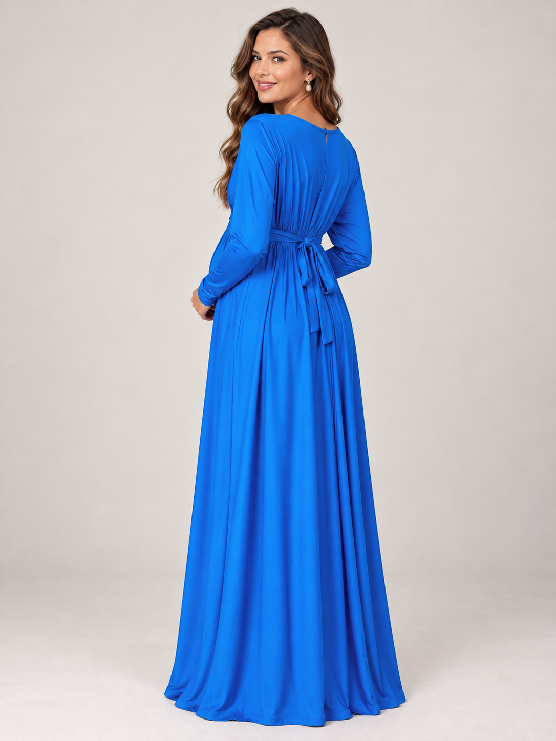 Nora Royal Blue maternity dress — back view of the waistband bow and long sleeves