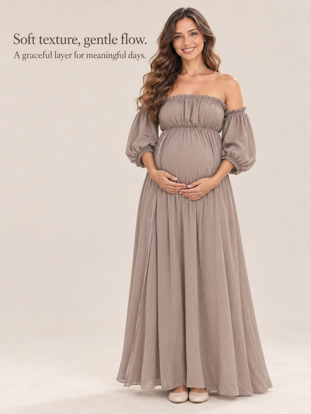 Elodie Taupe maternity dress — full-length view of the crinkle fabric in soft light