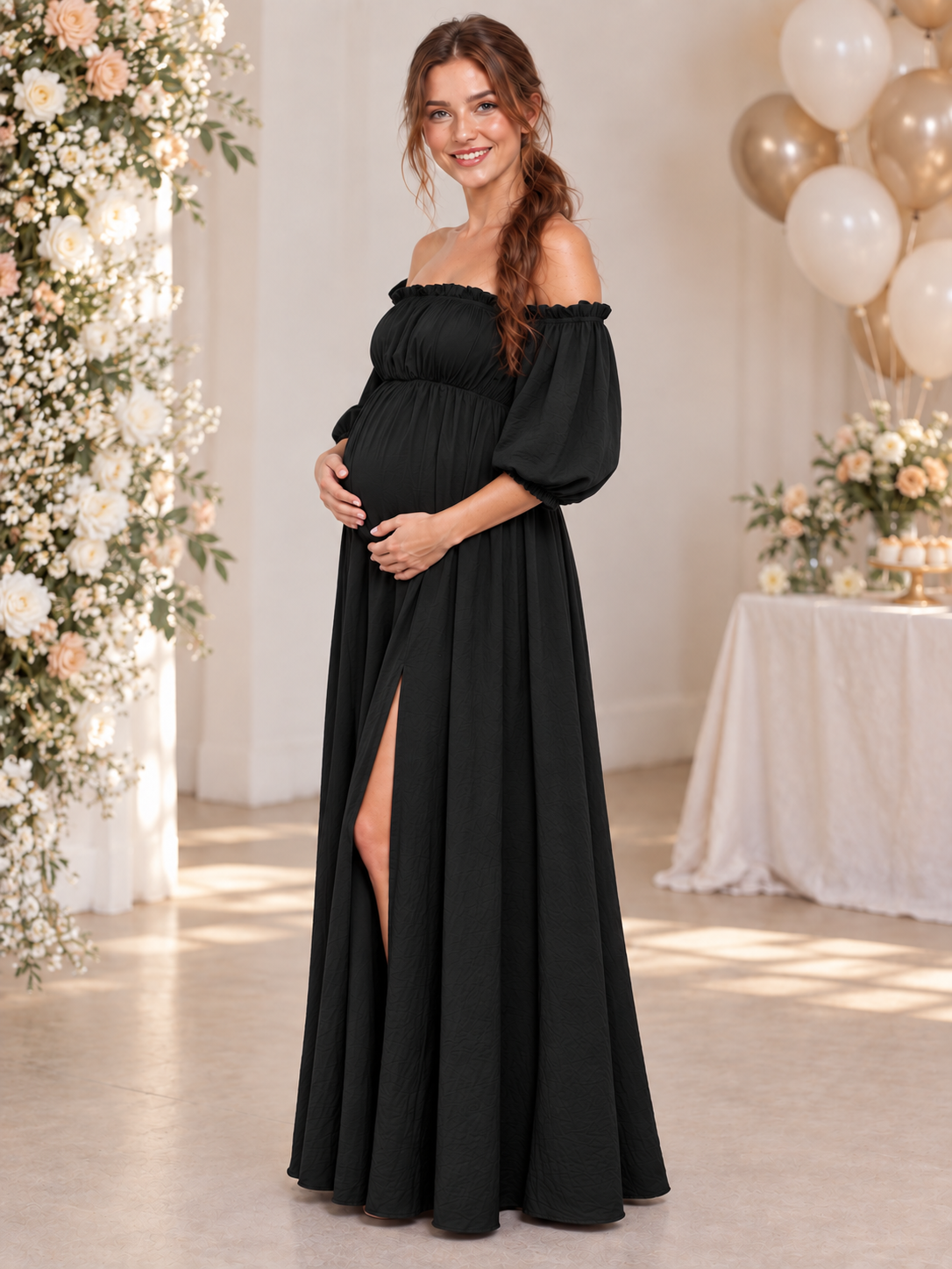 Elodie Black maternity dress — three-quarter view of the high waist and front slit at a baby shower