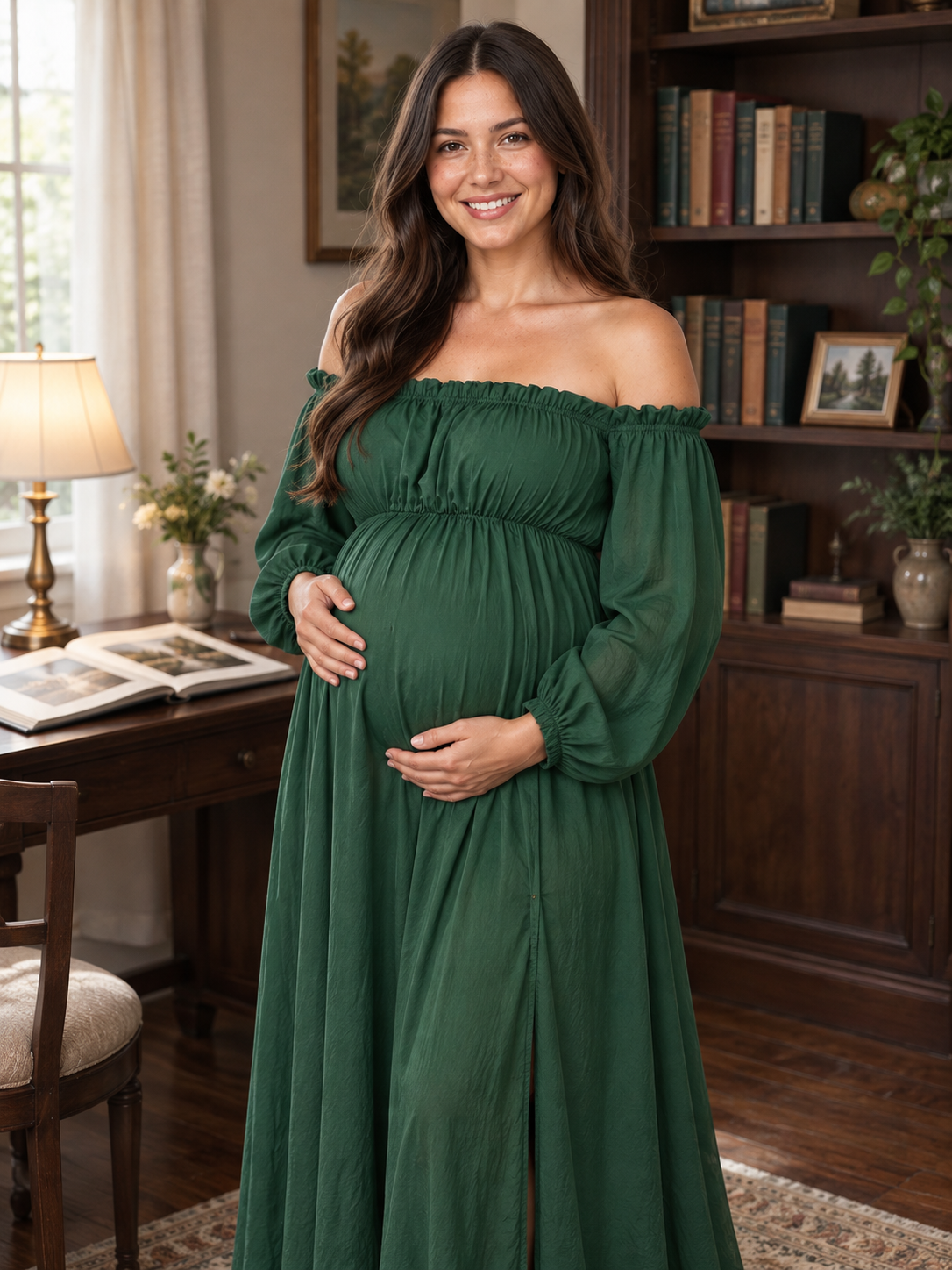 Elodie Forest Green maternity dress — maternity portrait in a cozy study with bookshelves