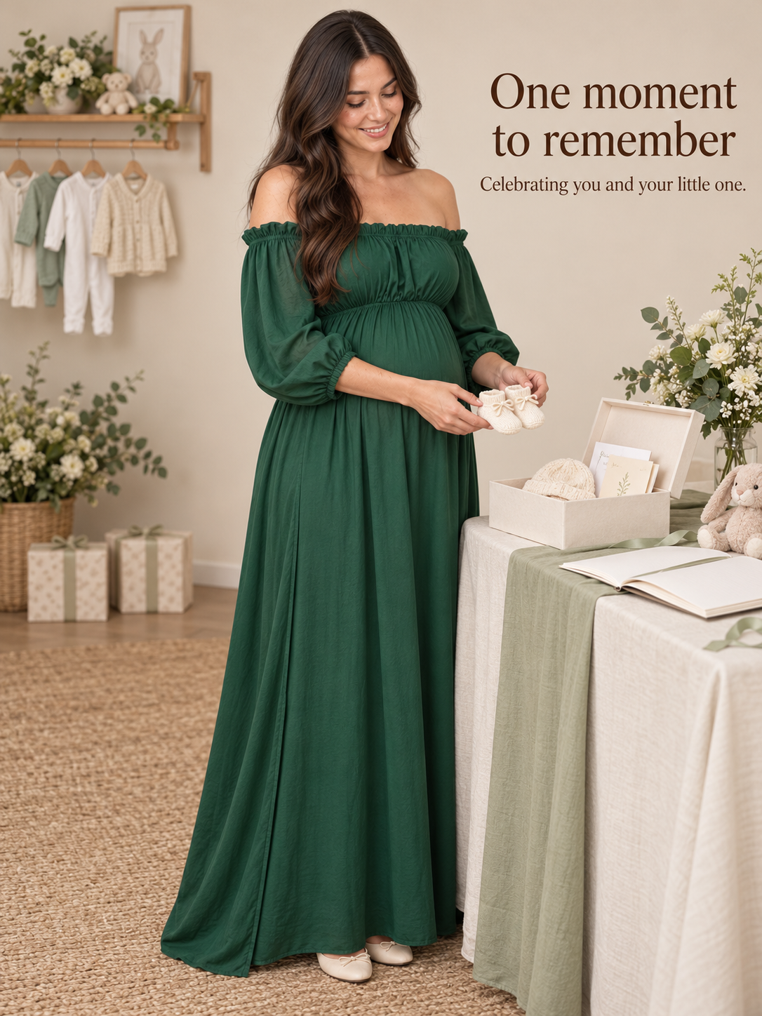 Elodie Forest Green maternity dress — holding baby booties beside a gift table