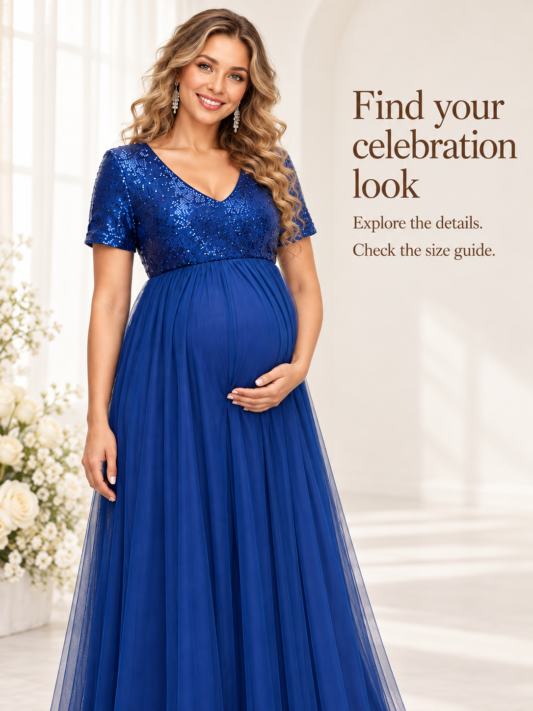 Celestine Royal Blue maternity dress — three-quarter-length portrait by a bright window with roses