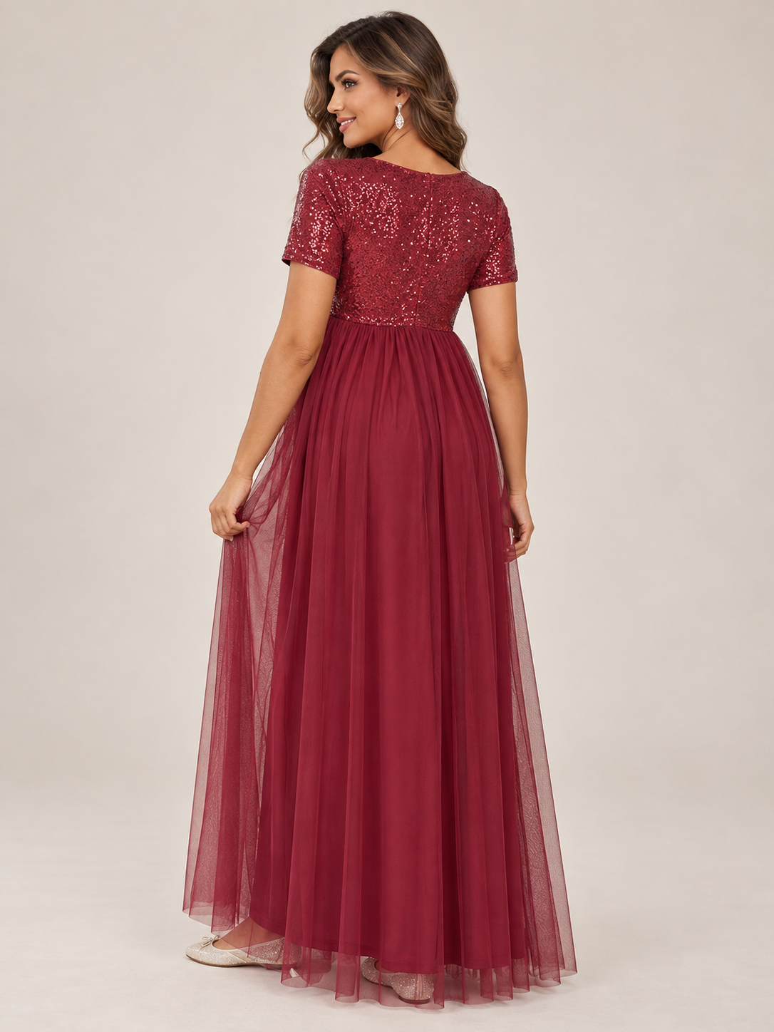 Celestine Burgundy maternity dress — back view of the closed sequin bodice and tulle skirt