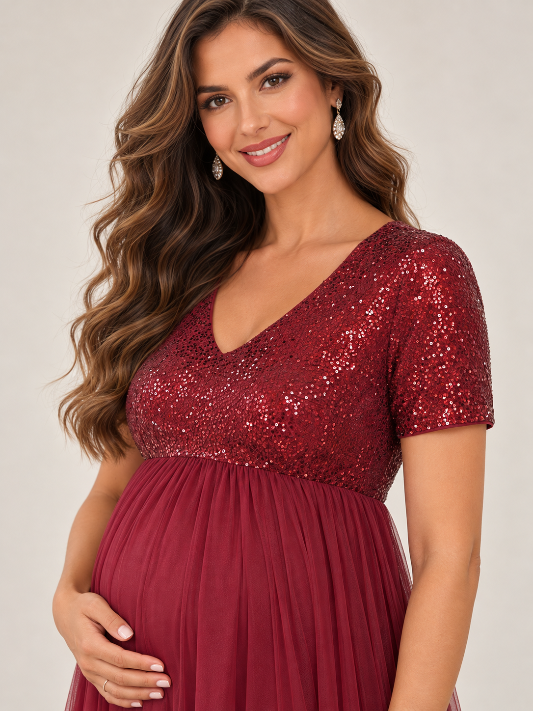 Celestine Burgundy maternity dress — short sequin sleeve and bodice detail
