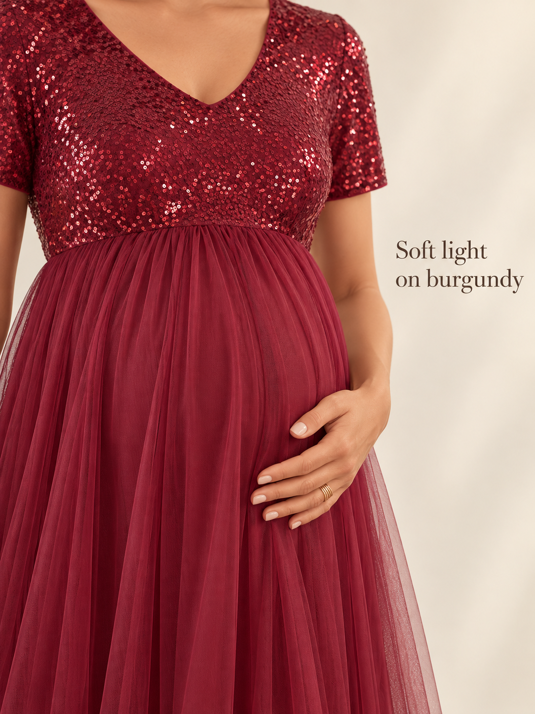 Celestine Burgundy maternity dress — sequin bodice and tulle skirt in soft light