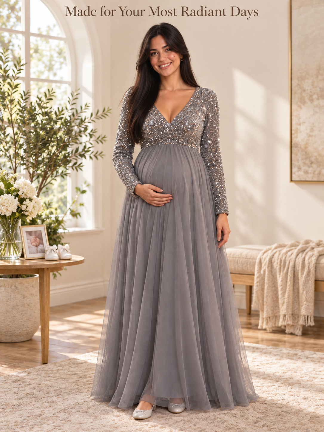 Theodora Silver Gray maternity dress — standing in a bright room with fresh flowers