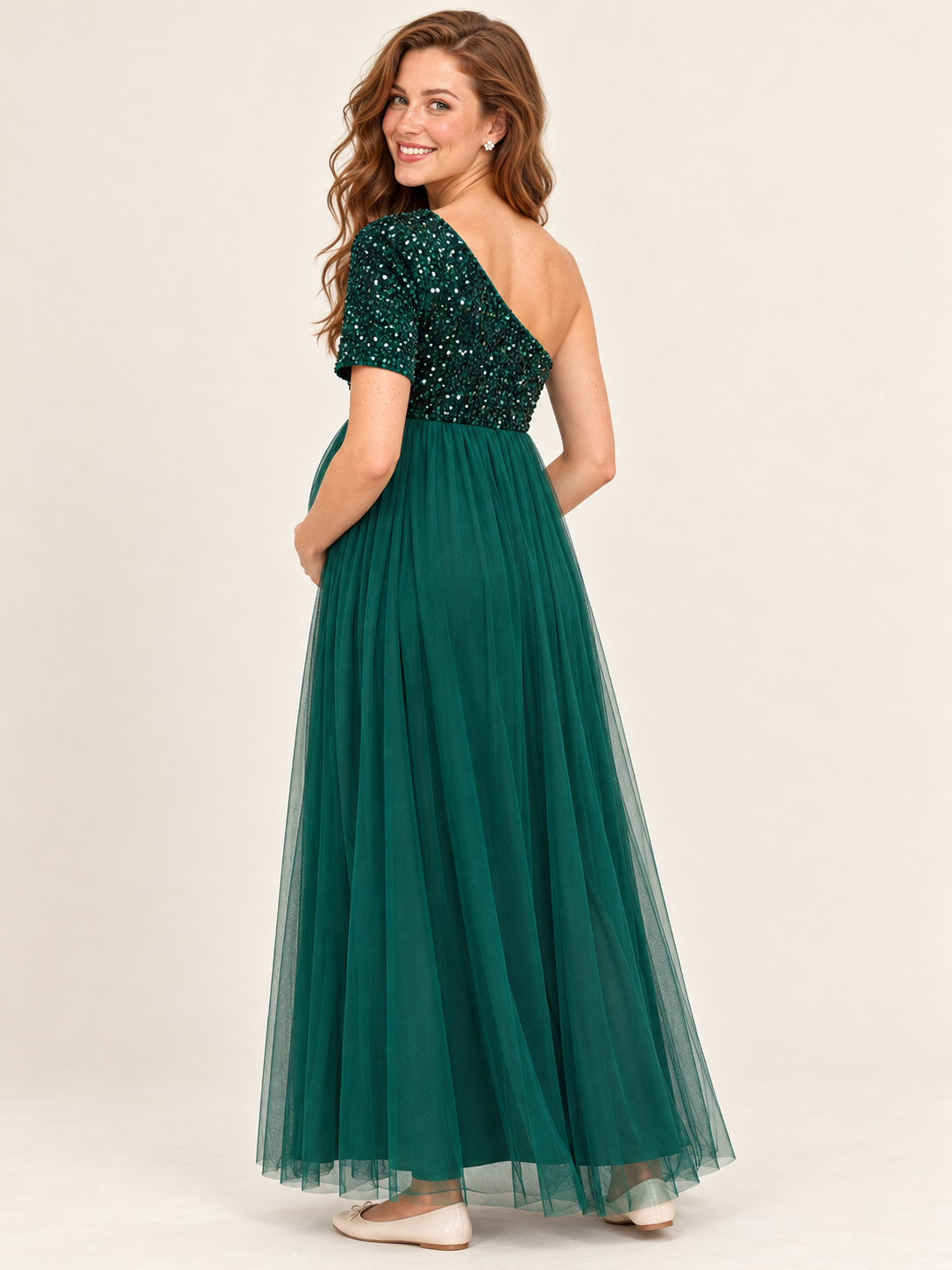 Rosalie Dark Green maternity dress — back view of the asymmetric neckline and single sleeve