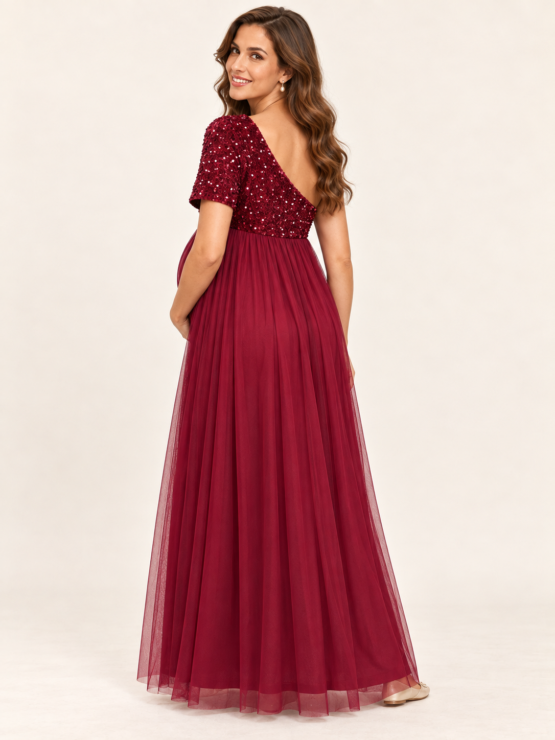 Rosalie Burgundy maternity dress — back view of the asymmetric neckline and single sleeve