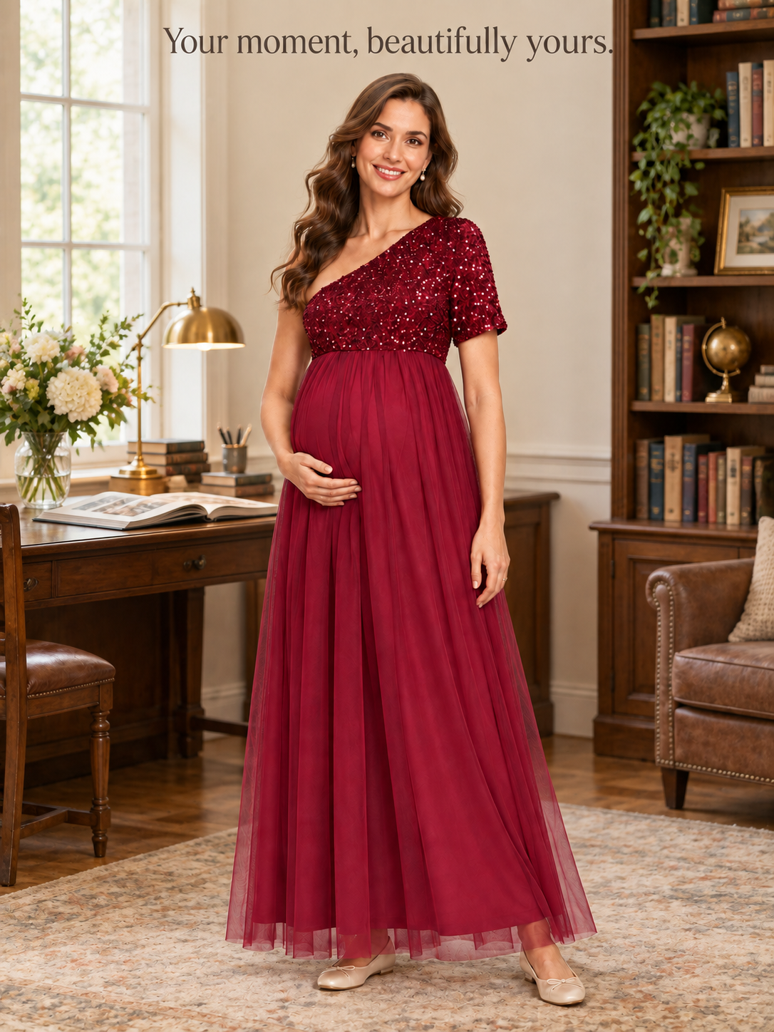 Rosalie Burgundy maternity dress — standing in a study with bookshelves