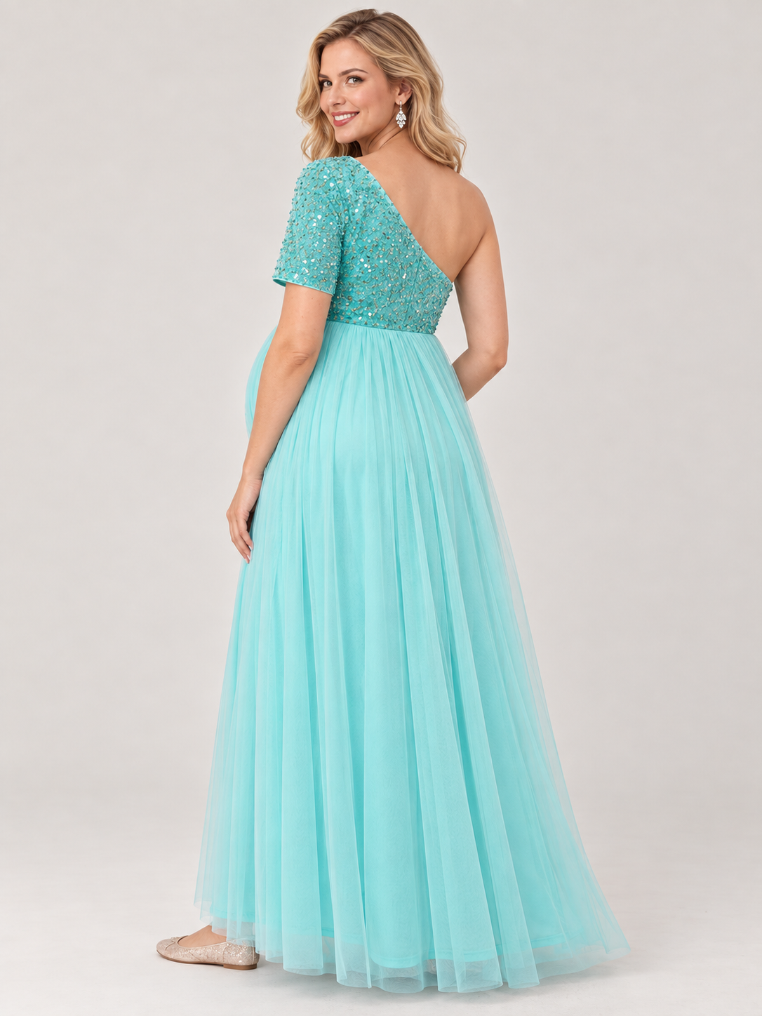 Rosalie Aqua maternity dress — back view of the asymmetric neckline and single sleeve