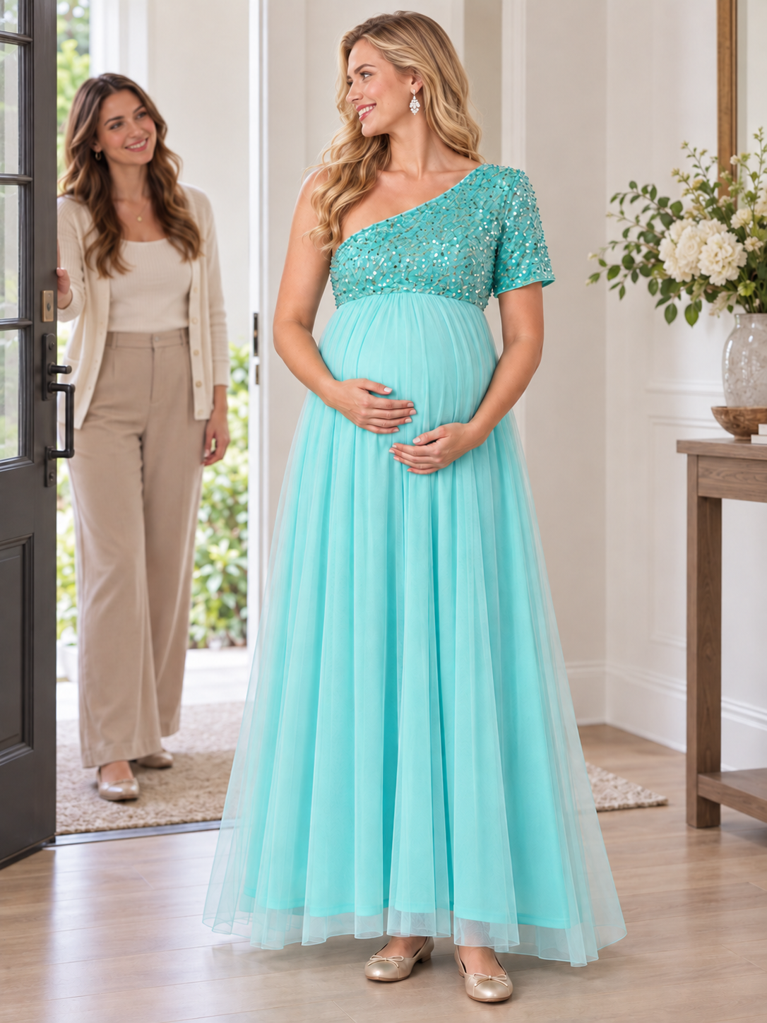 Rosalie Aqua maternity dress — a guest arriving at the front door