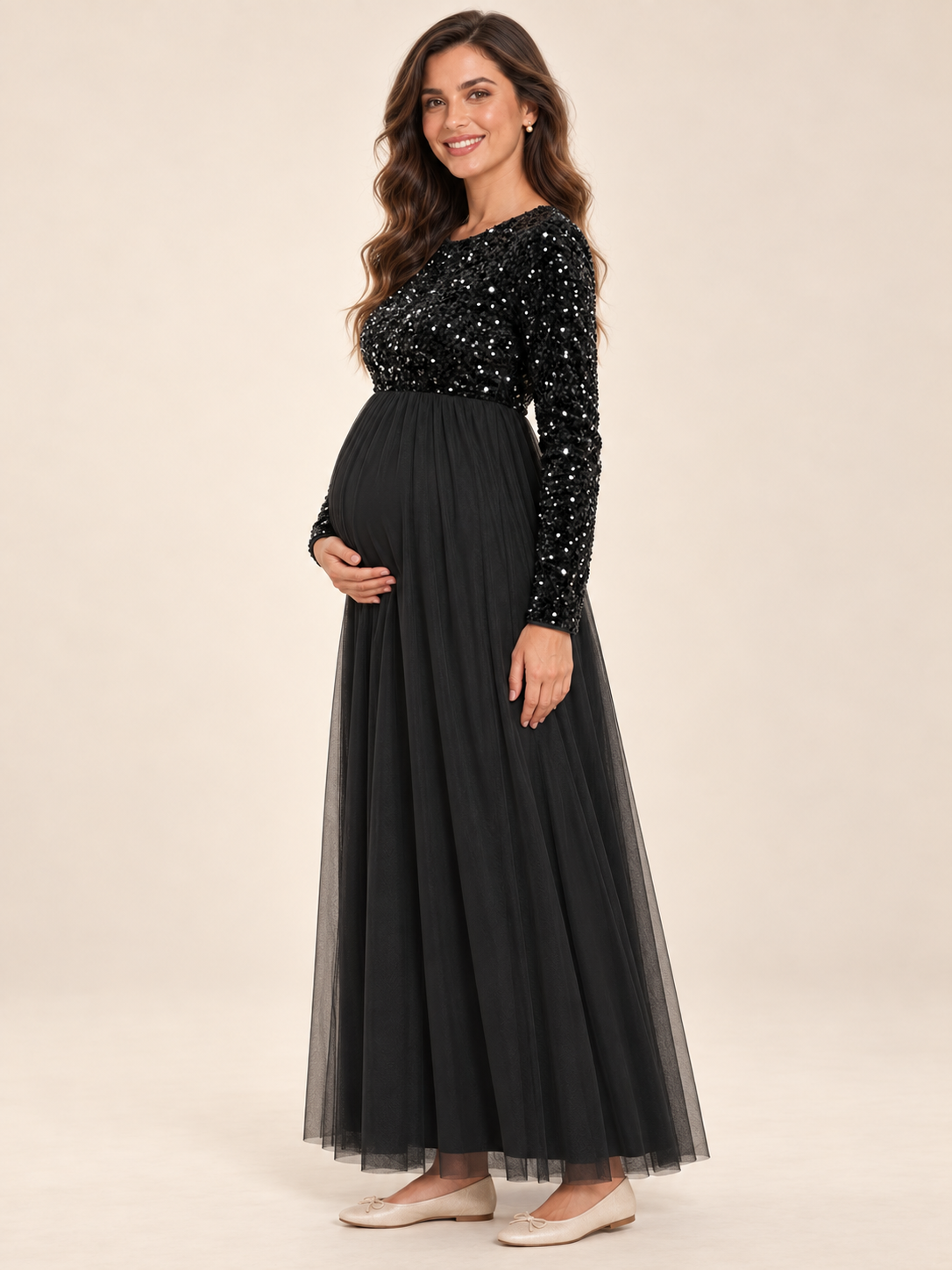 Noeline Black maternity dress — side view of the high waist and maternity silhouette