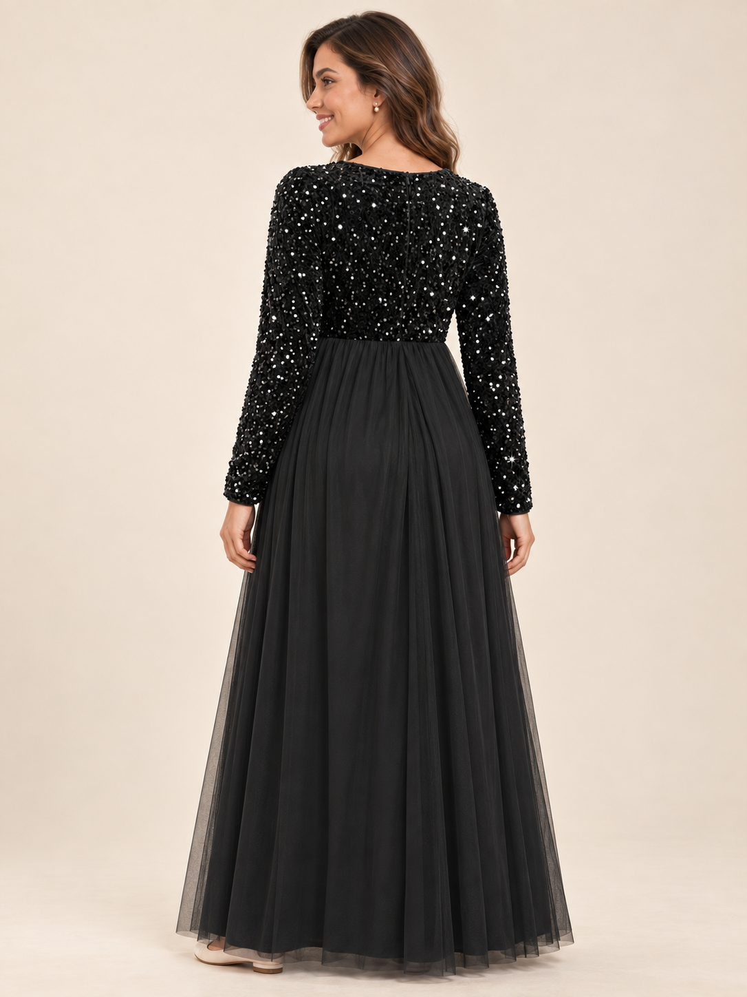 Noeline Black maternity dress — back view of the sequin bodice and high neckline