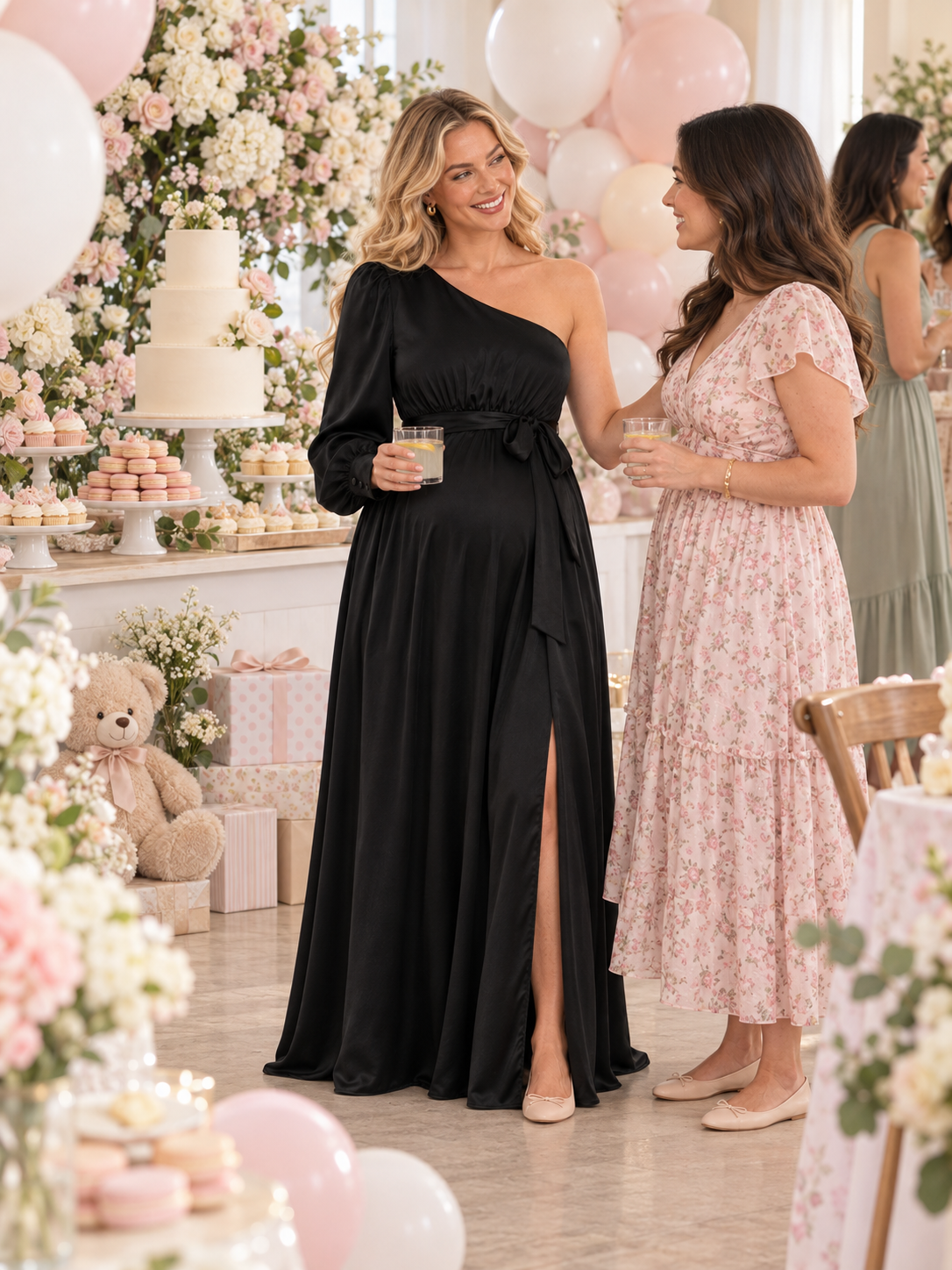 Sylvie Black maternity dress — chatting with a guest by the dessert table