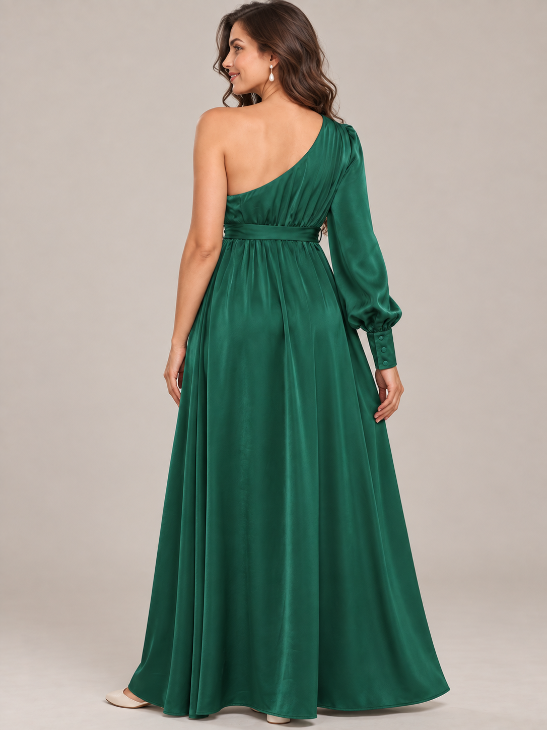 Sylvie Emerald Green maternity dress — back view of the bare shoulder, long sleeve and buttoned cuff