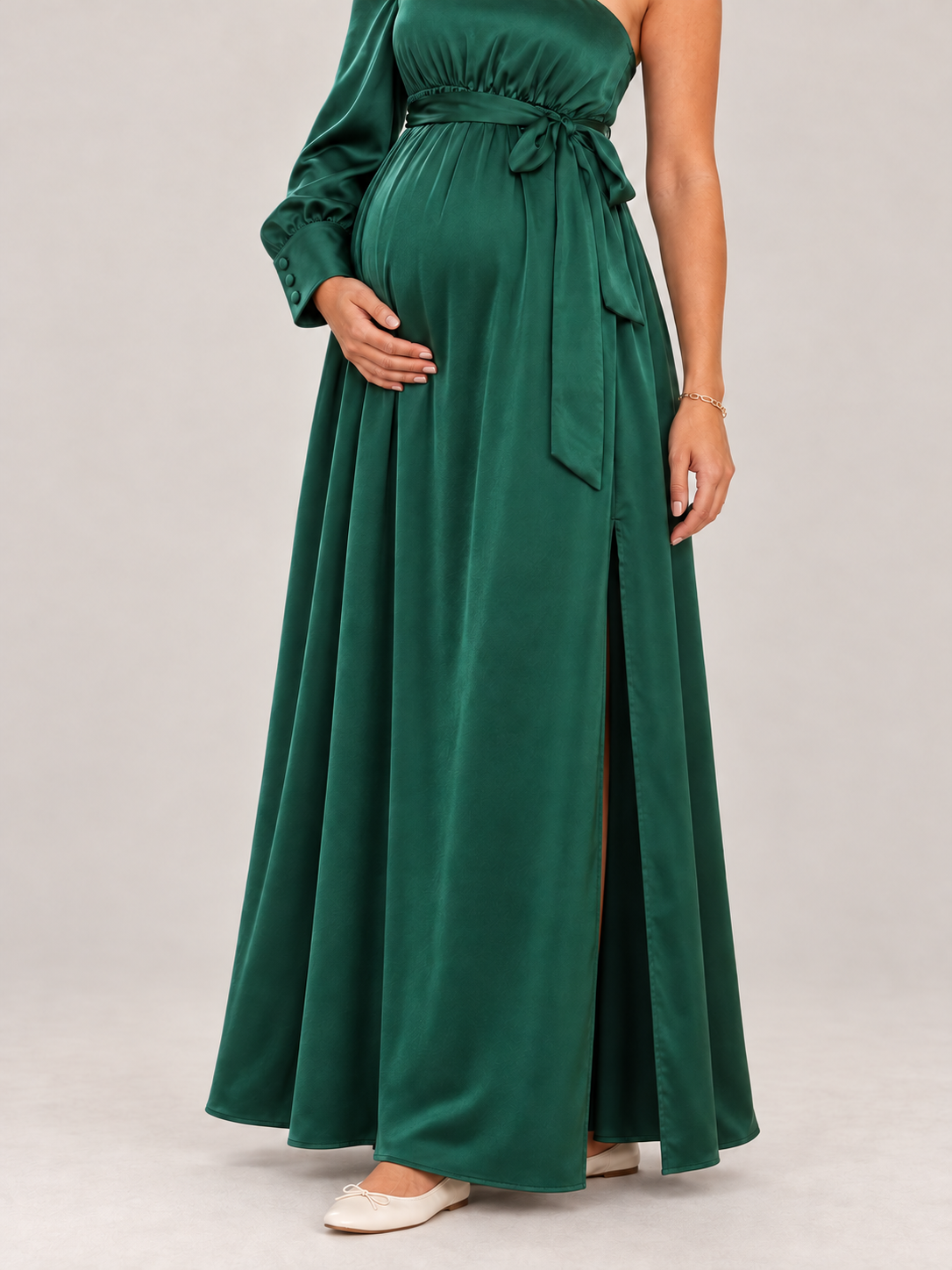 Sylvie Emerald Green maternity dress — skirt drape and the slit at the wearer's left front