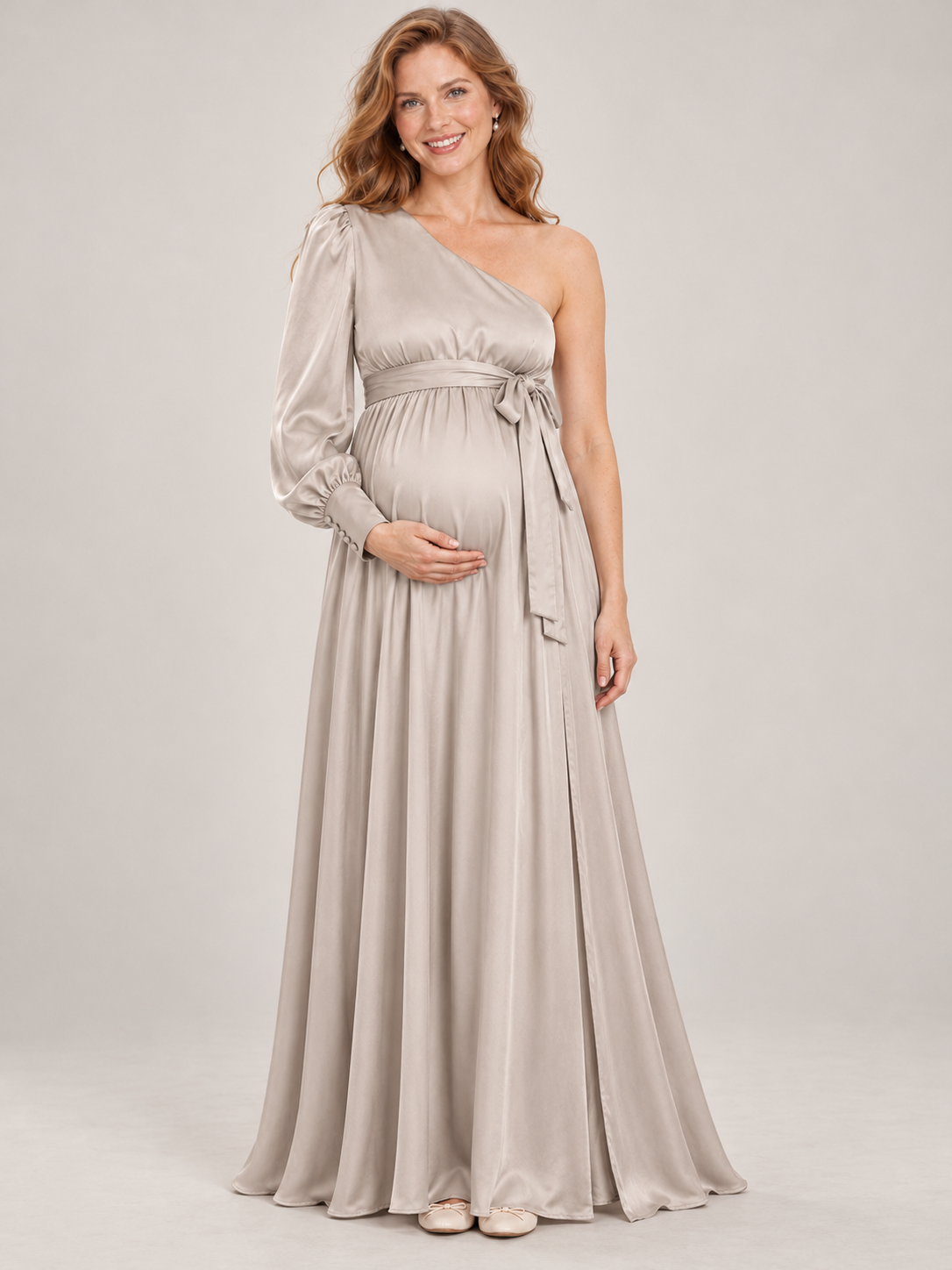 Sylvie Dove Gray maternity dress — full-length studio front view with one long sleeve and a bow-tied waist