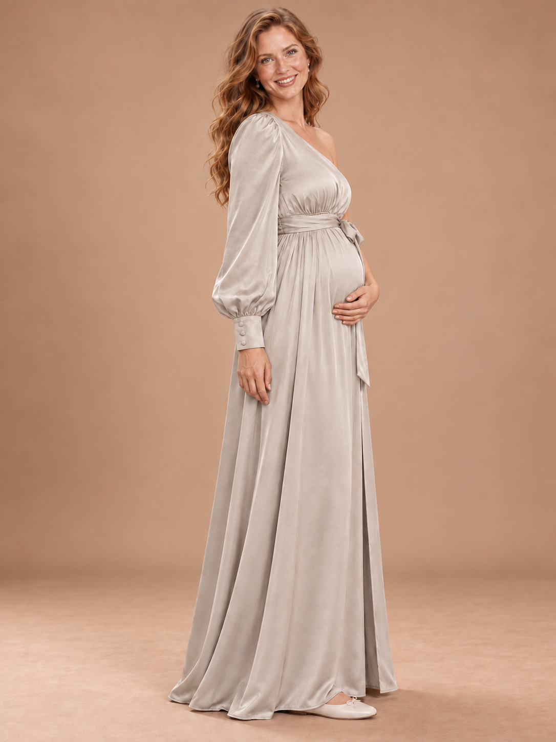 Sylvie Dove Gray maternity dress — side view of the long sleeve, buttoned cuff and tie over the bump