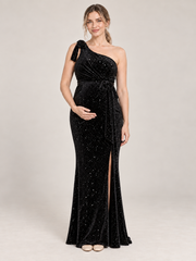 Ines Black maternity dress — front view with tied one-shoulder neckline, waist tie and front slit