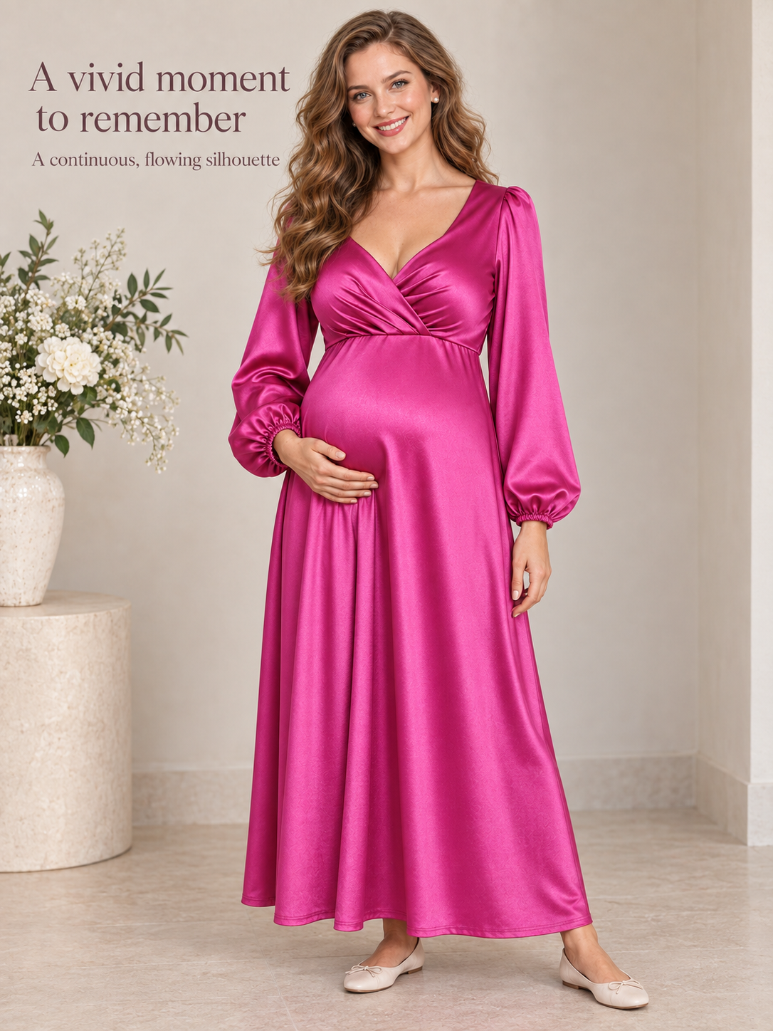 Marguerite Magenta maternity dress — full-length flowing silhouette beside white flowers