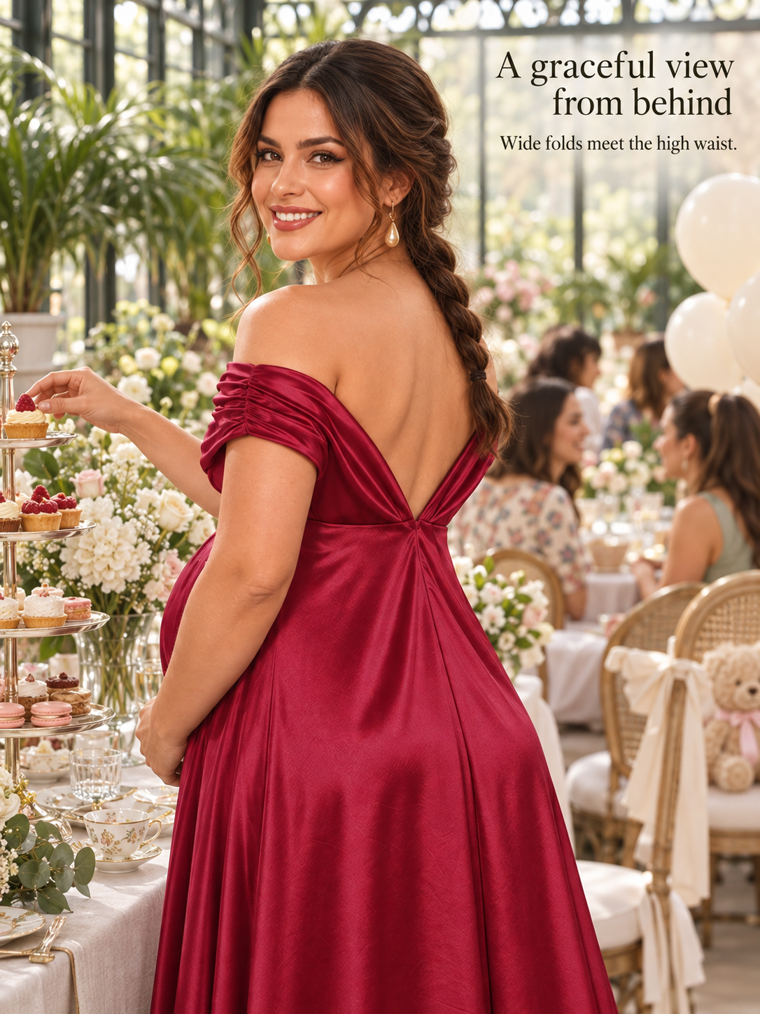 Cressida Wine Red maternity dress — back view by a dessert stand showing the deep V back
