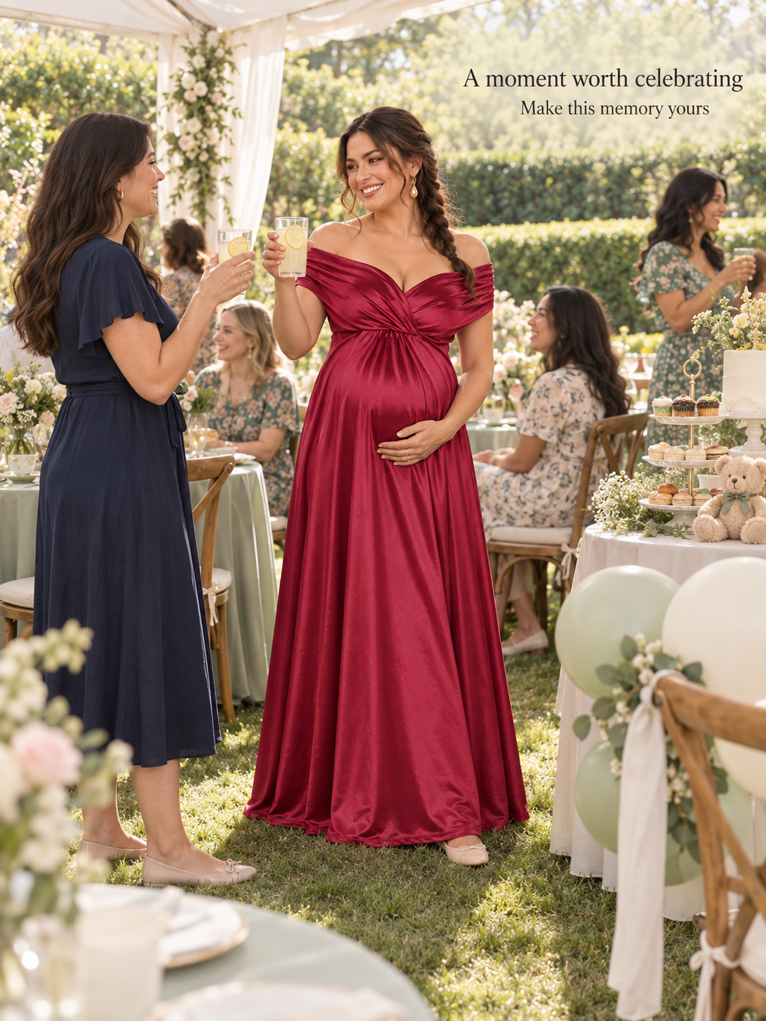 Cressida Wine Red maternity dress — raising a glass with a friend at a garden baby shower