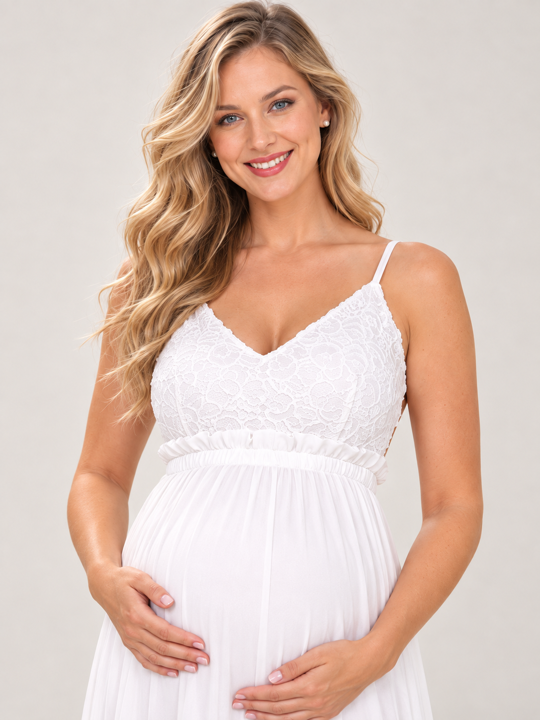 Alessia White maternity dress — lace V-neckline and ruffled empire waist close-up