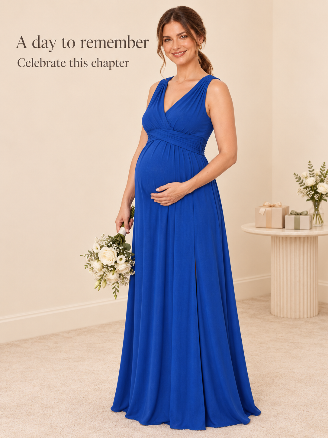 Amara Royal Blue maternity dress — holding a bouquet at a baby shower