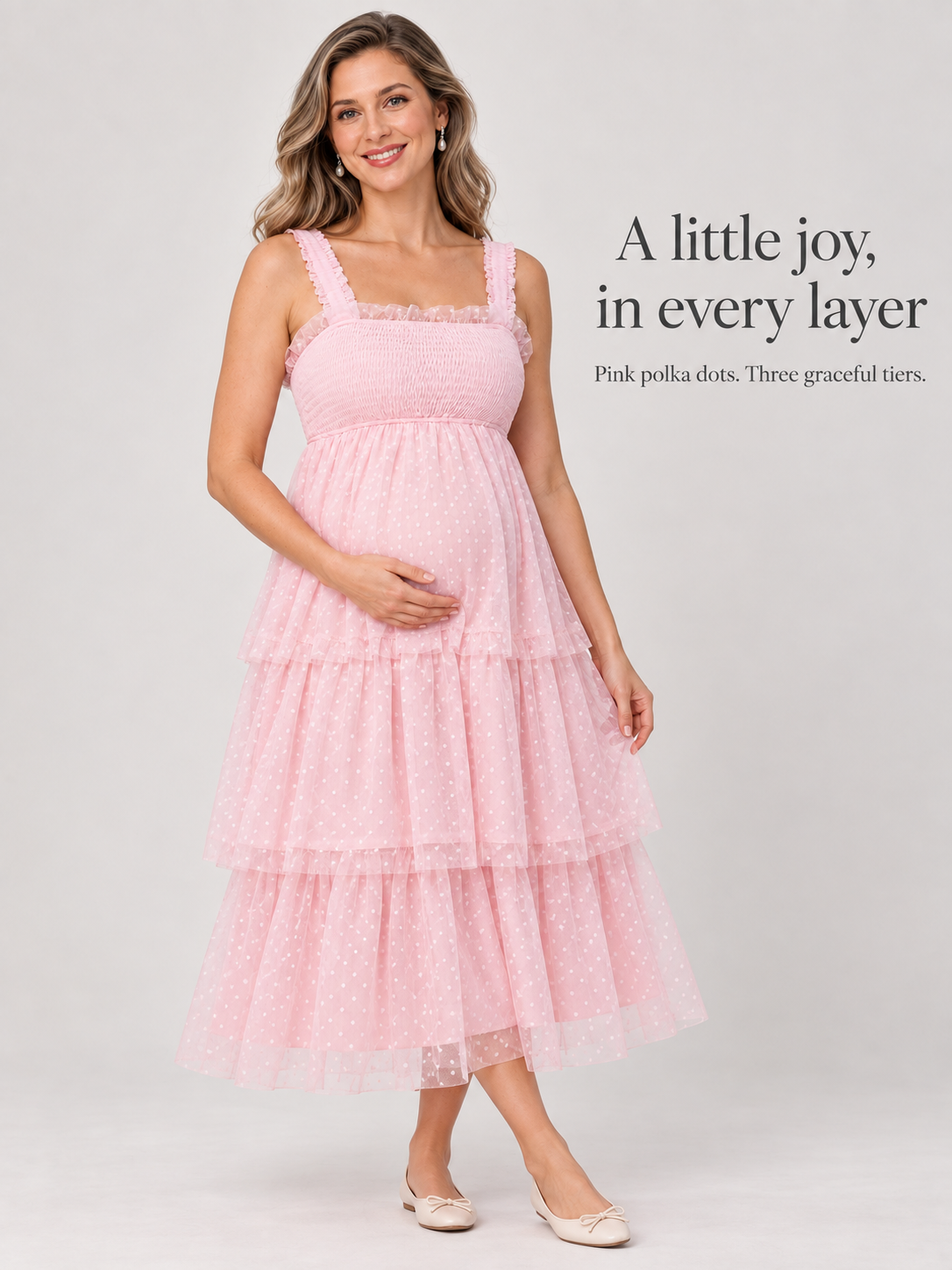 Clara Light Pink maternity dress — full tiered silhouette in a studio portrait