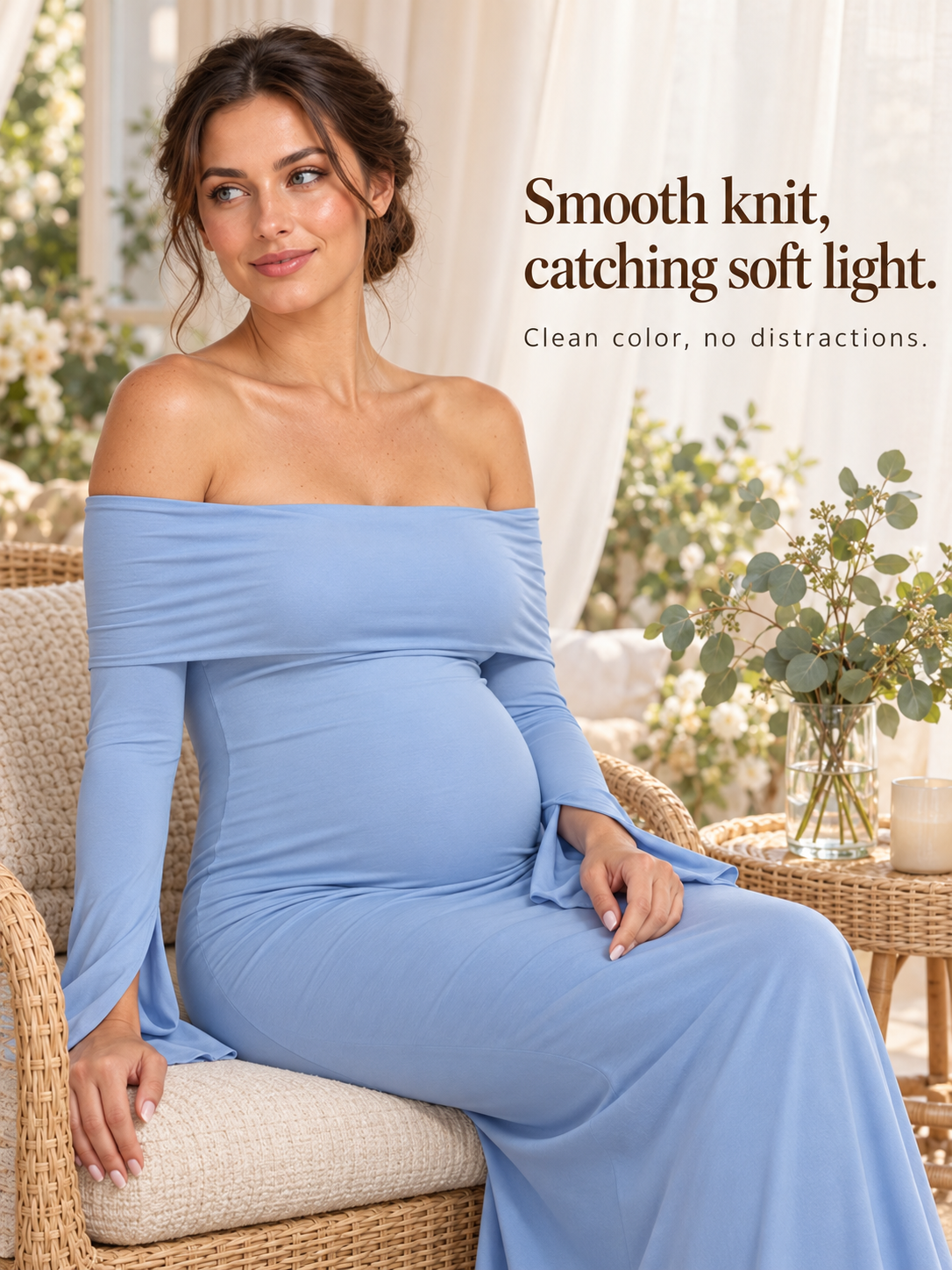 Arabella Periwinkle Blue maternity dress — seated in a rattan chair on a patio