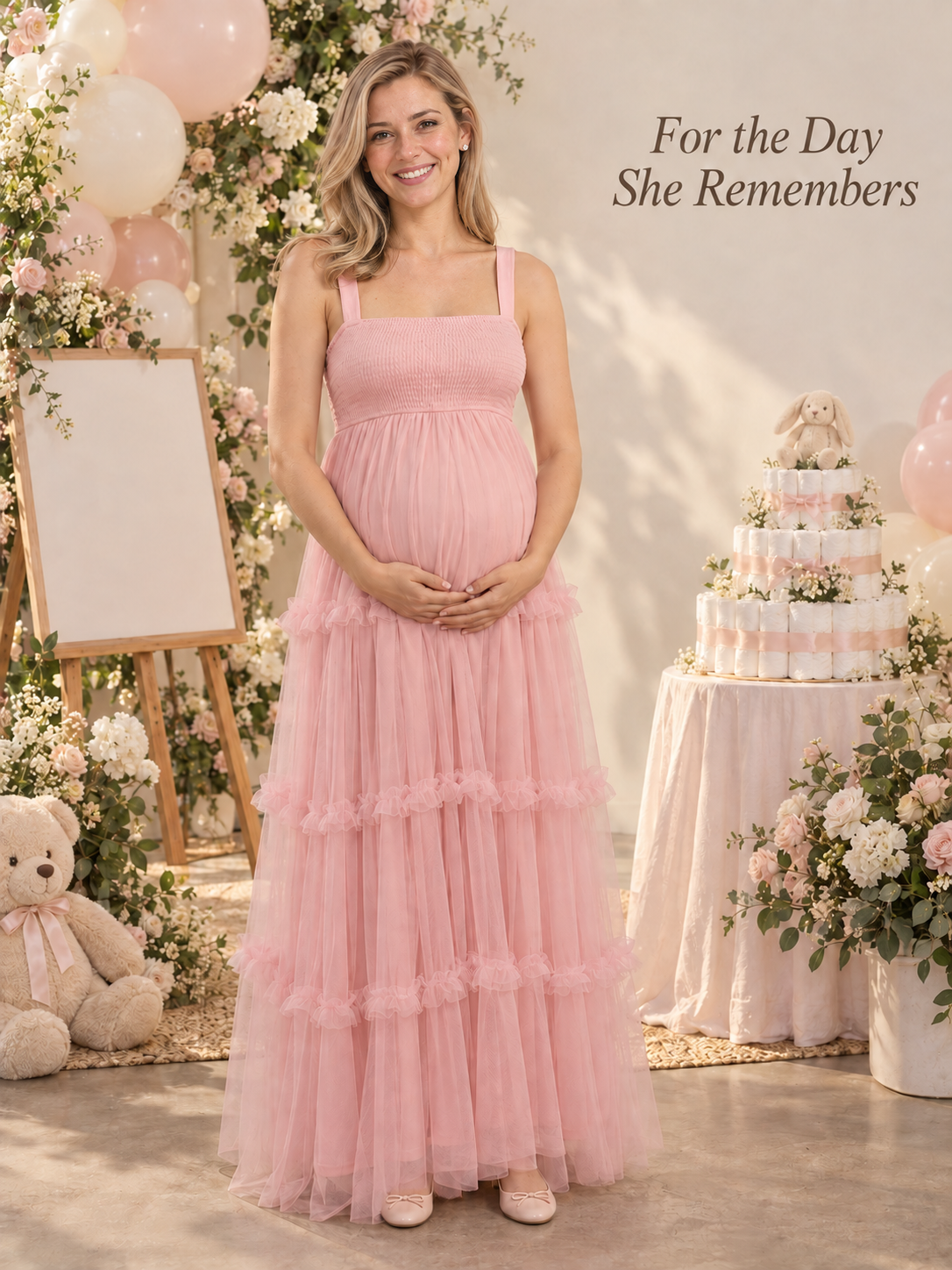 Lorelei Light Pink maternity dress — baby shower moment beside a diaper cake
